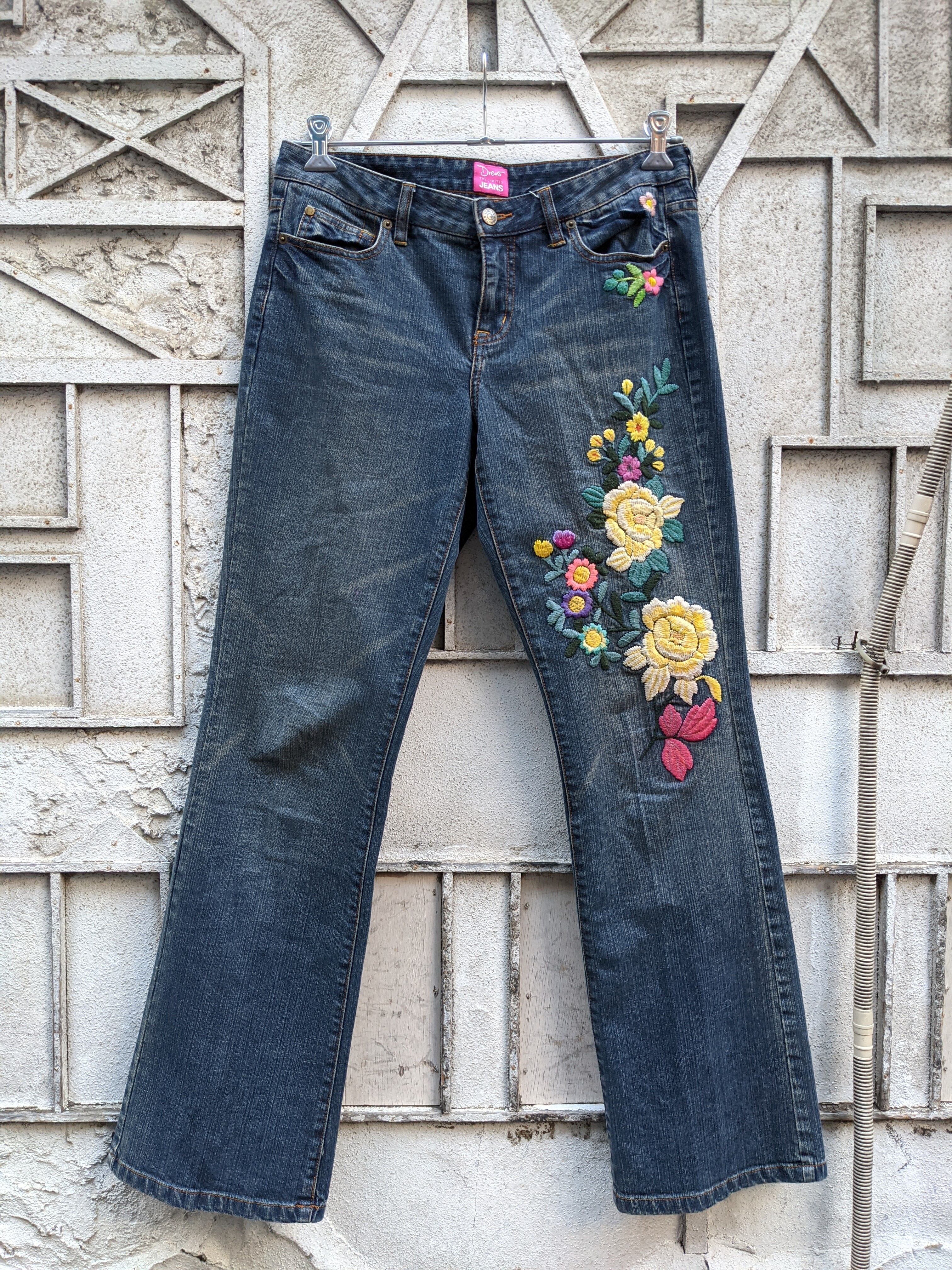 "FLOWER" embroidery flair denim pants