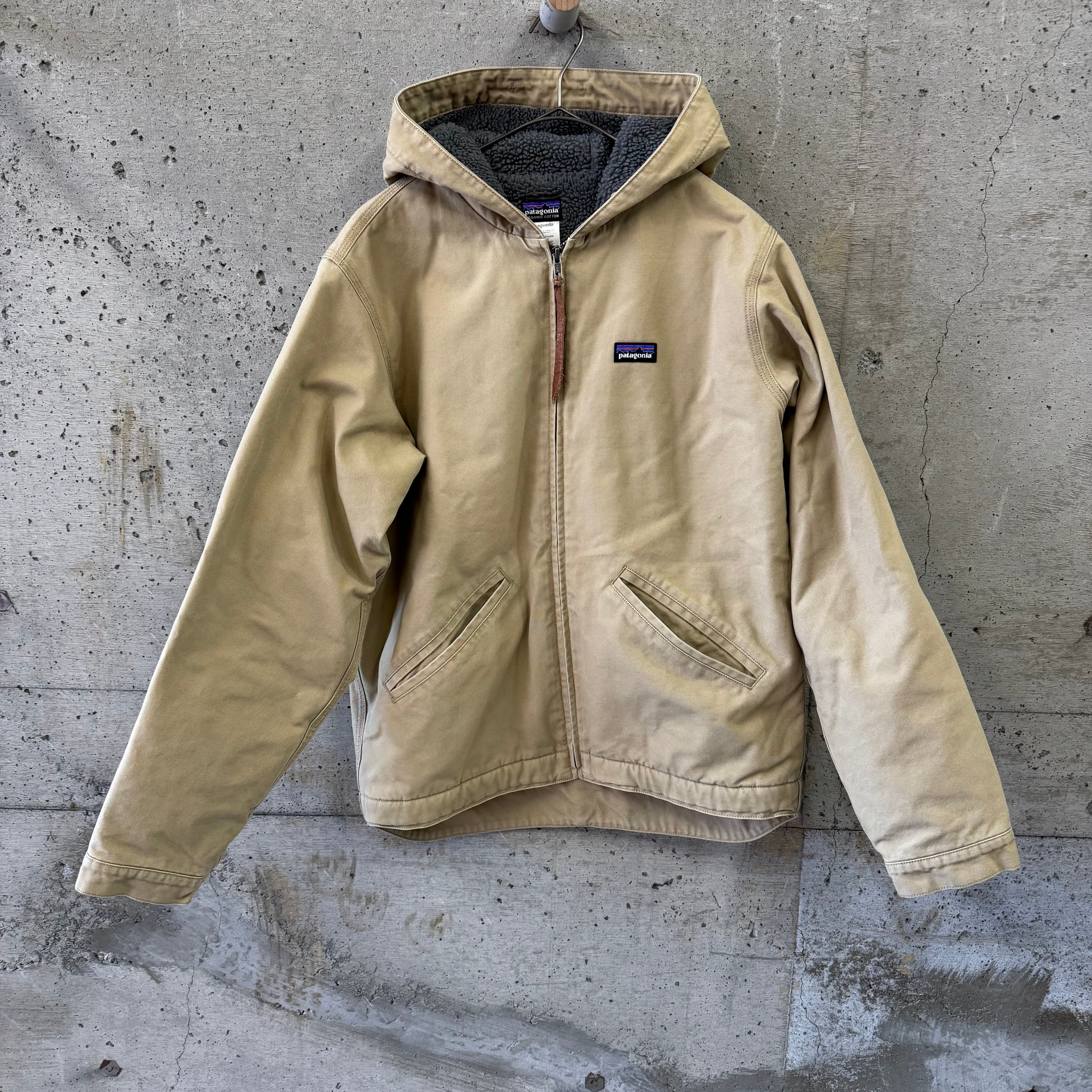 Beige fleece-lined padded jacket