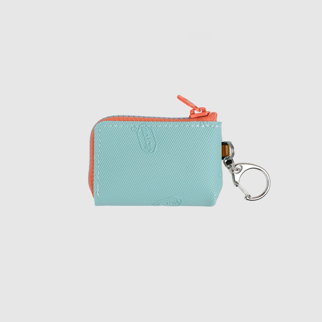 vibram coin pouch keychain (mint×orange) with blue glowing zip
