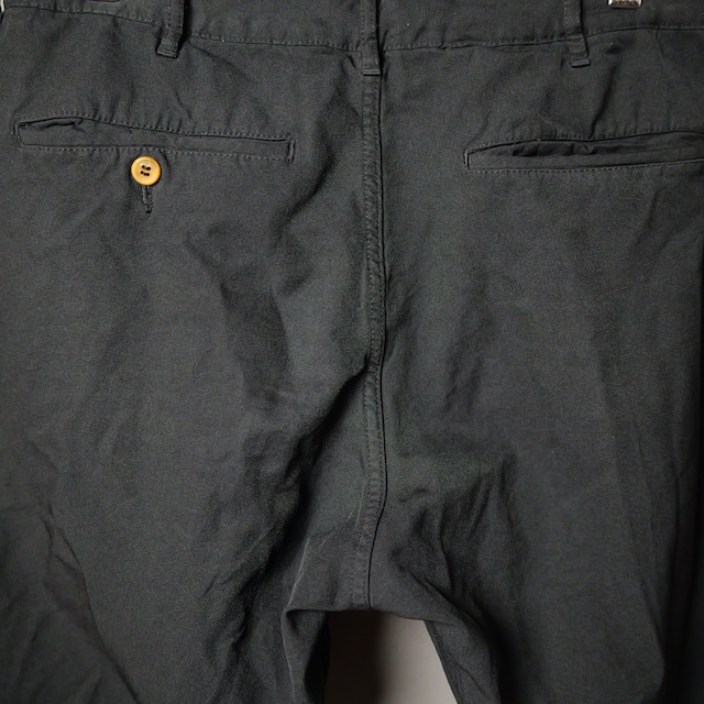 [COMME des GARÇONS HOMME PLUS] ポリ縮絨スラックス