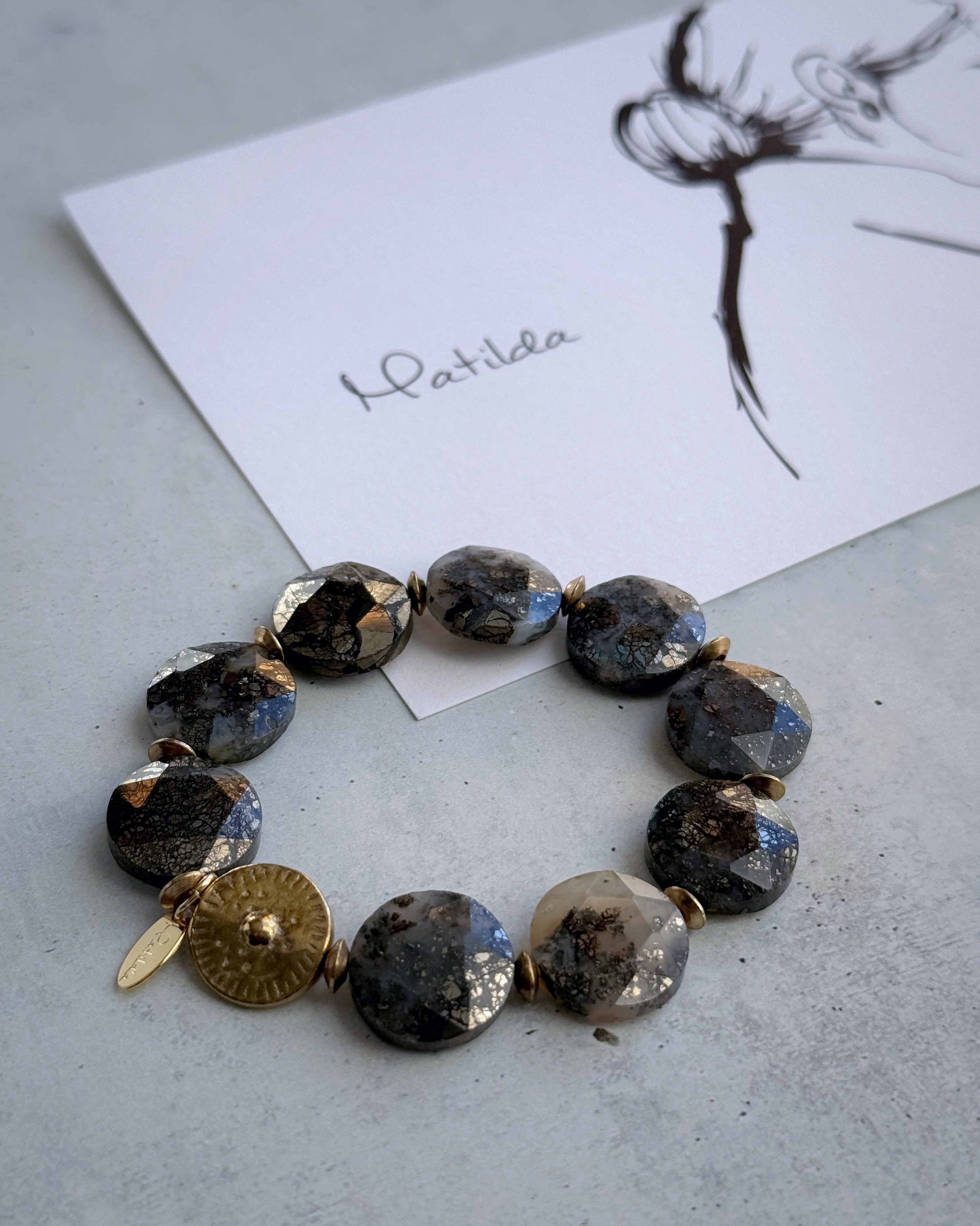 tumble bracelet(ニポモマーカサイト)