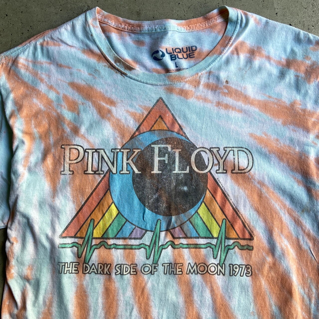 LIQUID BLUE PINK FLOYD THE DARK SIDE OF THE MOON ピンクフロイド ダークサイドオブザムーン タイダイ  バンドTシャツ メンズL 古着 オレンジ ライトブルー 水色【Tシャツ】【FSS2308-50b】 | cave 古着屋【公式】古着通販サイト