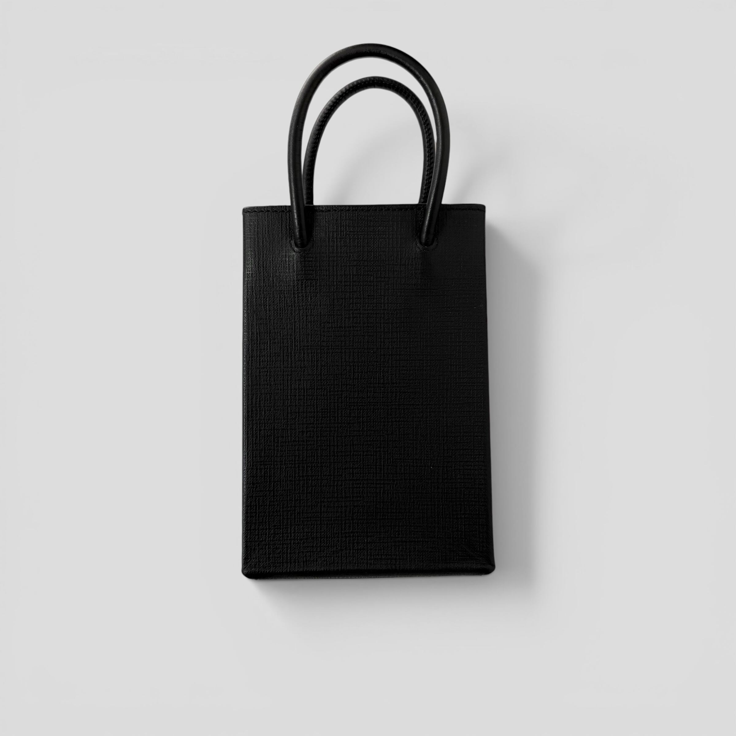 BALENCIAGA Shopping Phone Holder Black | BRAND RESORT Online