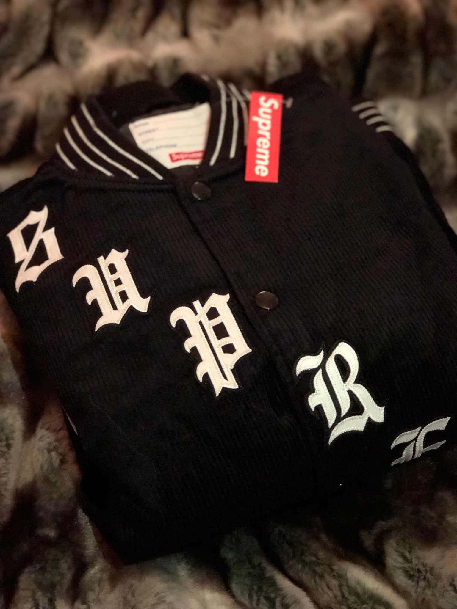 supreme old english varsity jacket