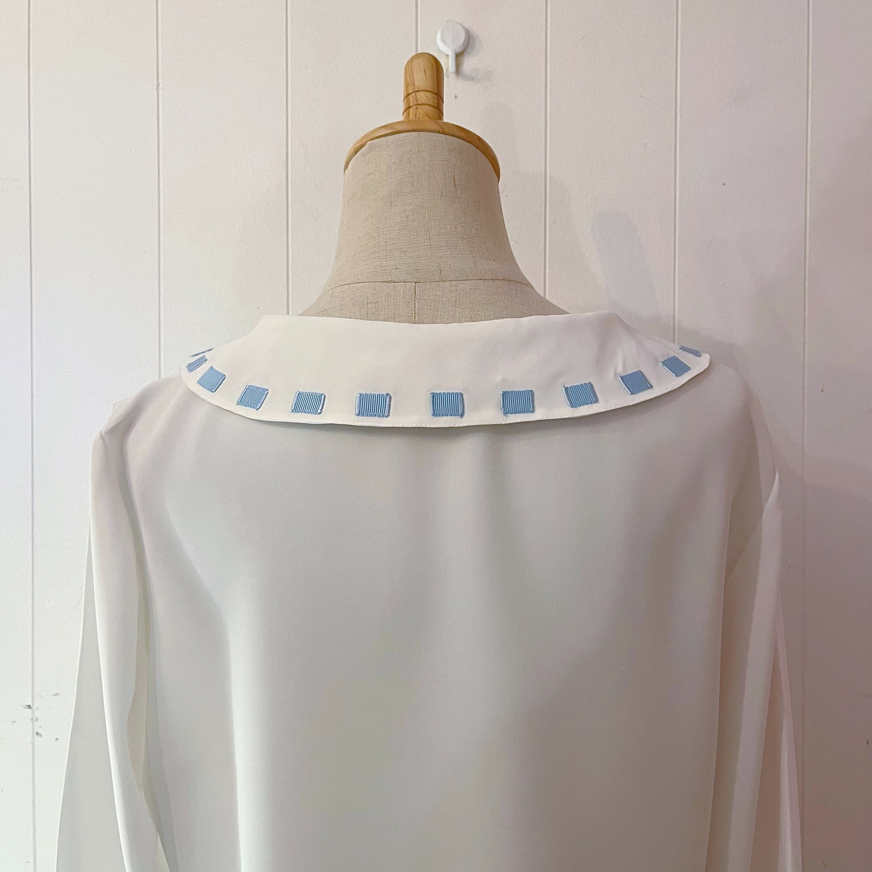 light blue ribbon white blouse