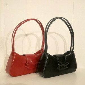 ribbon round shoulder bag