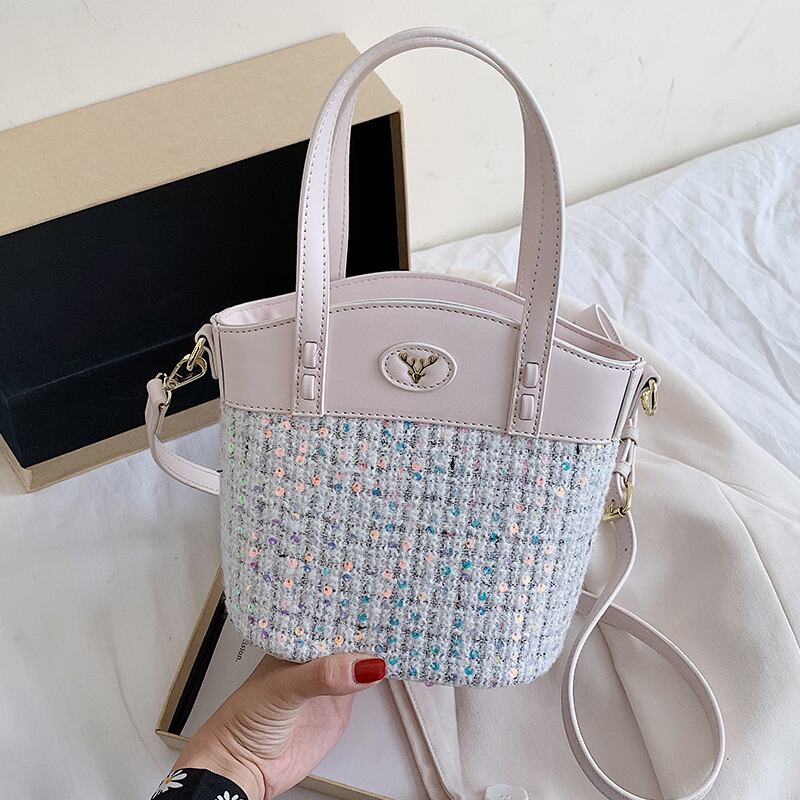 ネットレッドレディーバッグ2020新しいトレンディなファッションポータブルワイルドメッセンジャーバッグins eignスタイルショルダーバケットバッグ Tiancai_Wing_Bag2010572