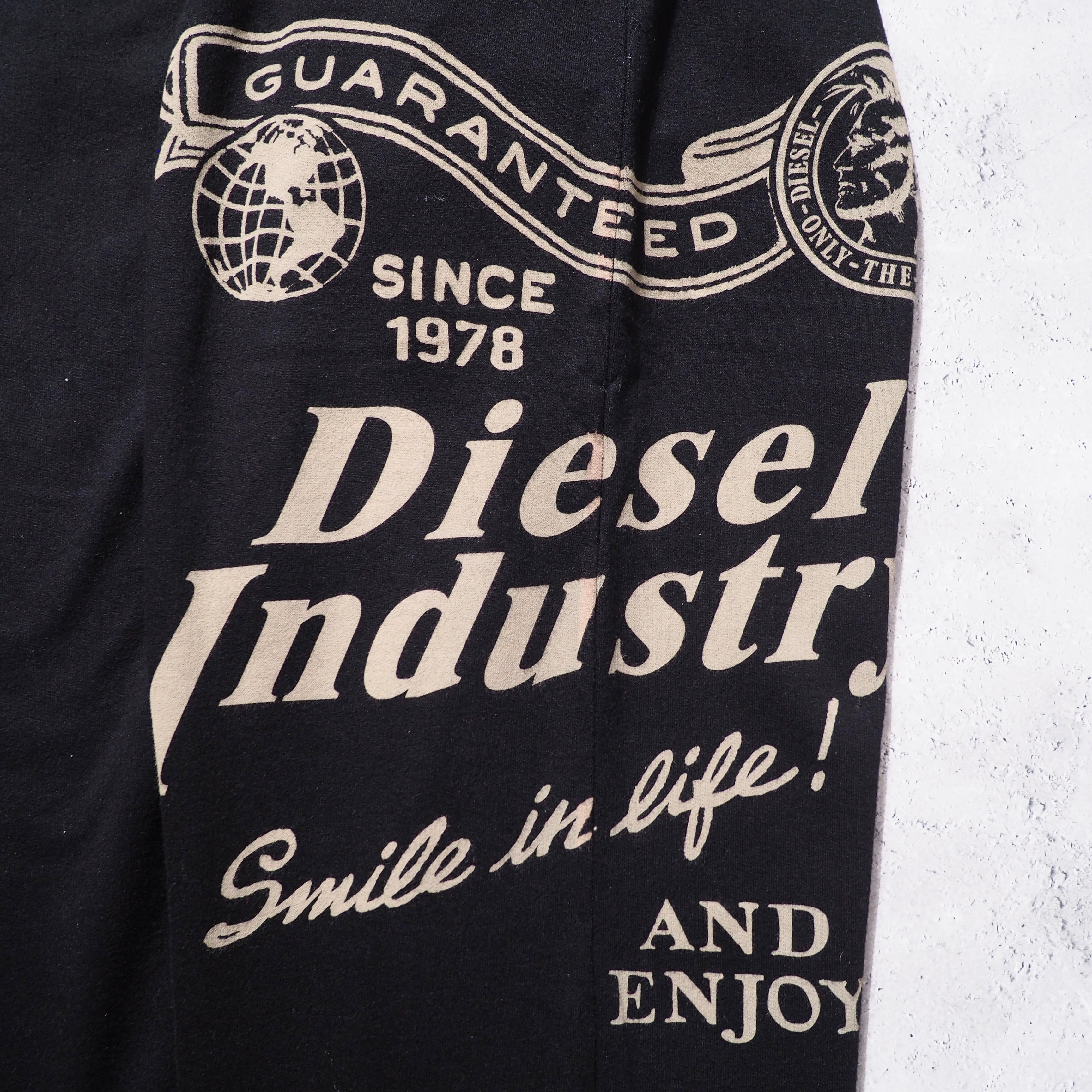 ” DIESEL ” Graphic logo printed wide Sweat pants