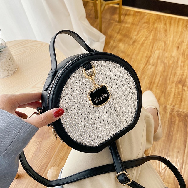 バッグ2020夏の新しいトレンディなファッション野生のポータブルメッセンジャーバッグinsネット赤いショルダースモールラウンドバッグ Tiancai_Wing_Bag0166757