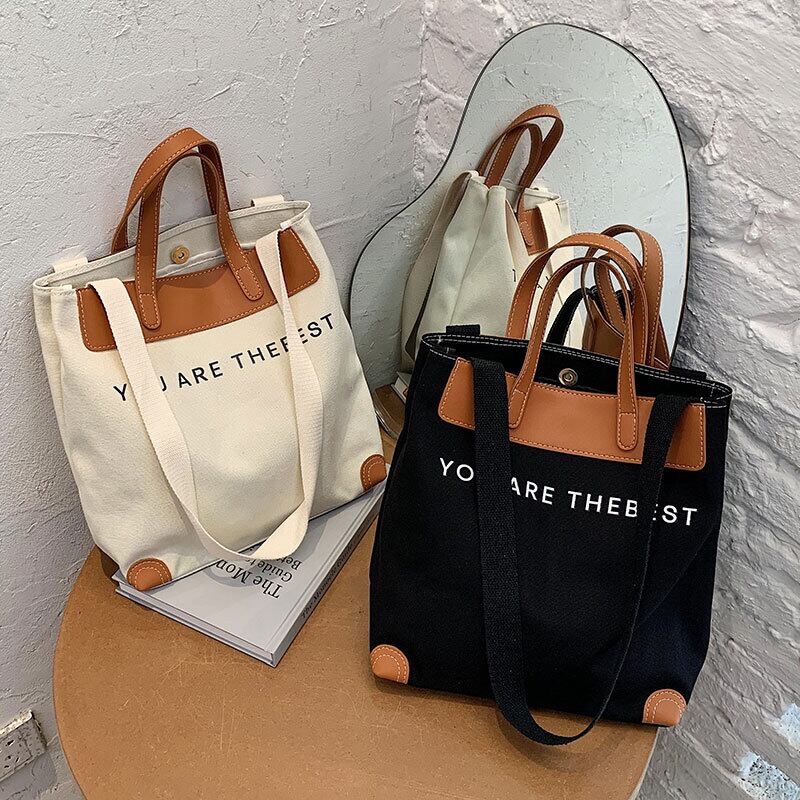 大容量バッグハンドバッグ2020新しい流行のファッションワイルドキャンバスショルダーバッグネットレッドシンプルなポータブルトートバッグ Tiancai_Wing_Bag43345452806