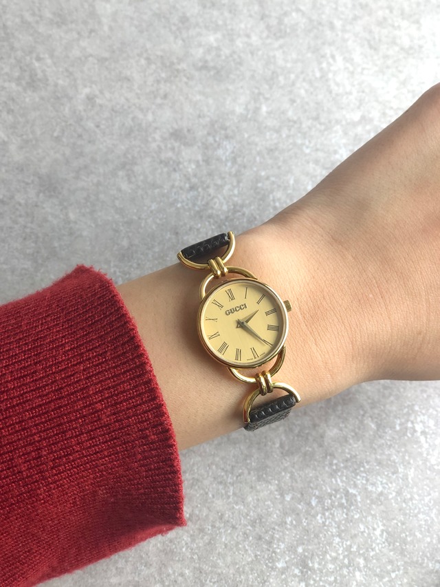 GUCCI グッチ 腕時計 ゴールド×ブラック ローマ文字 レザー 6000.2.L vintage ヴィンテージ オールド 6tkgex