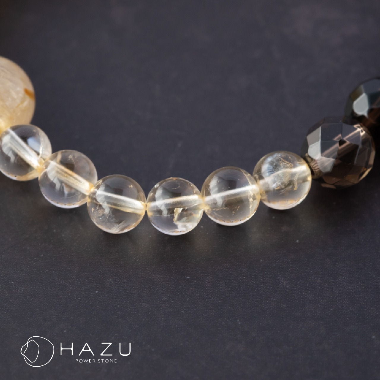 財を招き身を守る金運ブレス［ルチルクォーツ／スモーキークォーツ／シトリン／ヘマタイト］