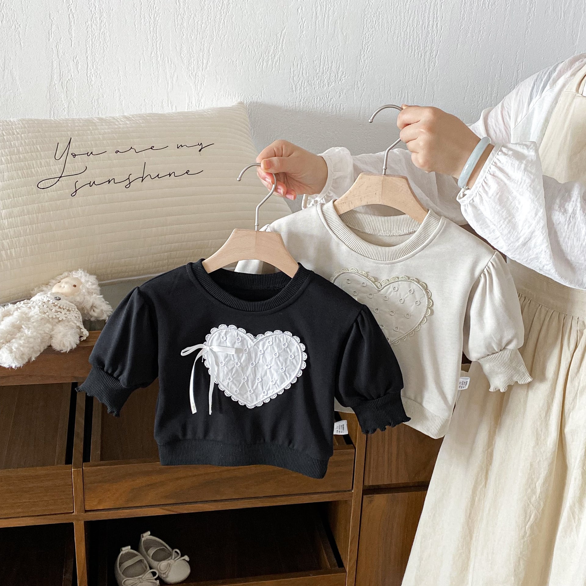 パフスリーブハートリボントレーナー