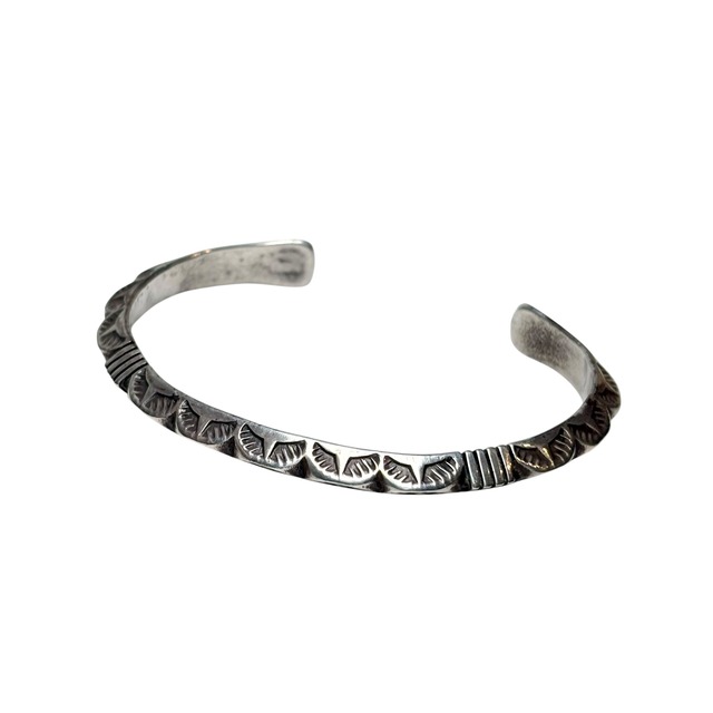 Navajo KEVIN RAMONE stamped silver triangle bangle
