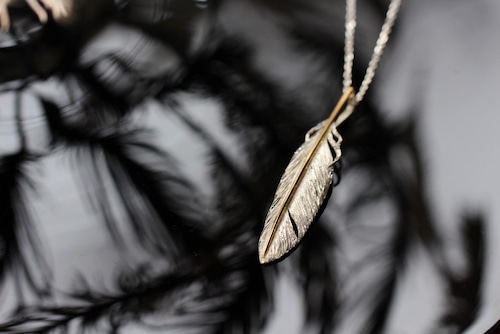 Gold Shaft Feather necklace