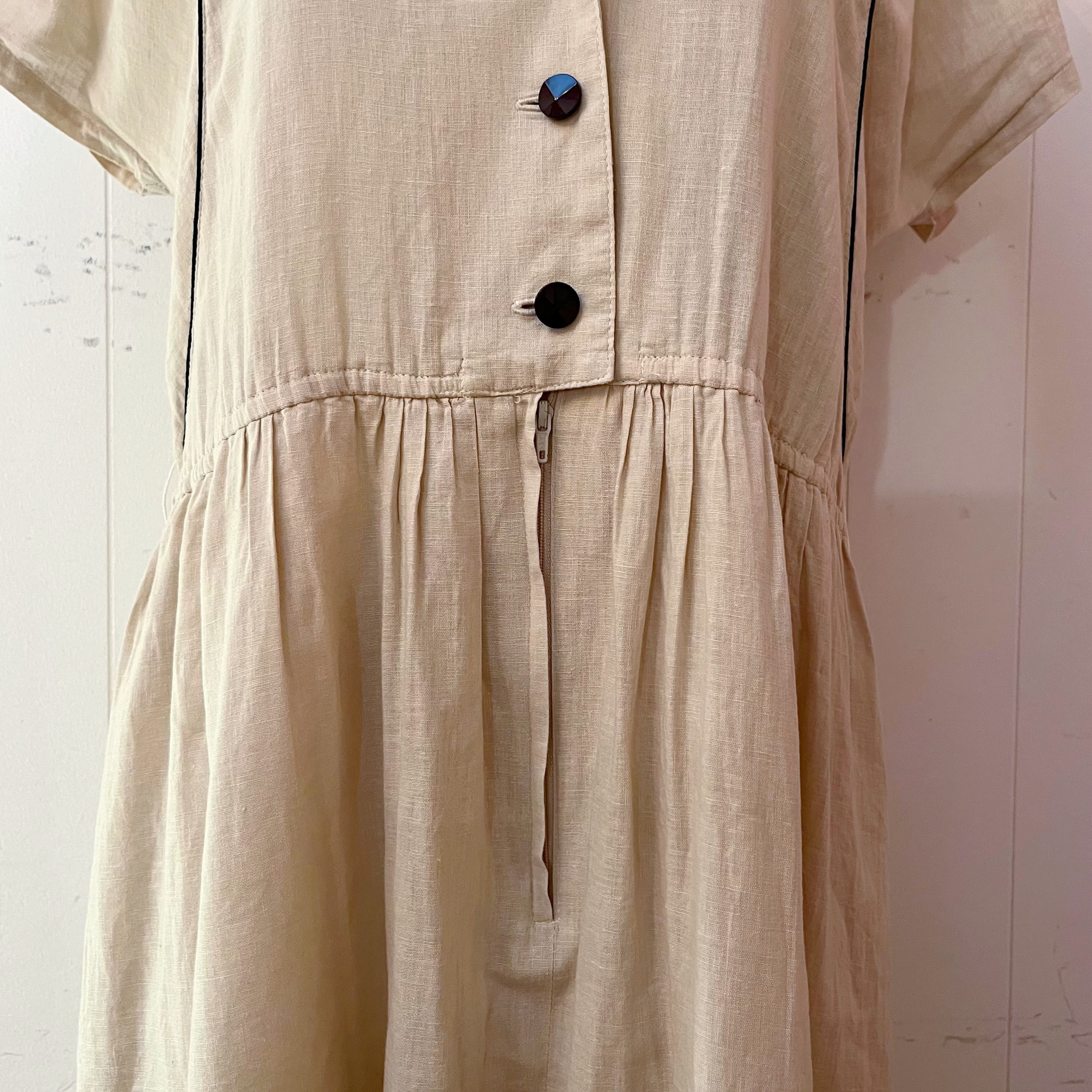 beige open collar one-piece