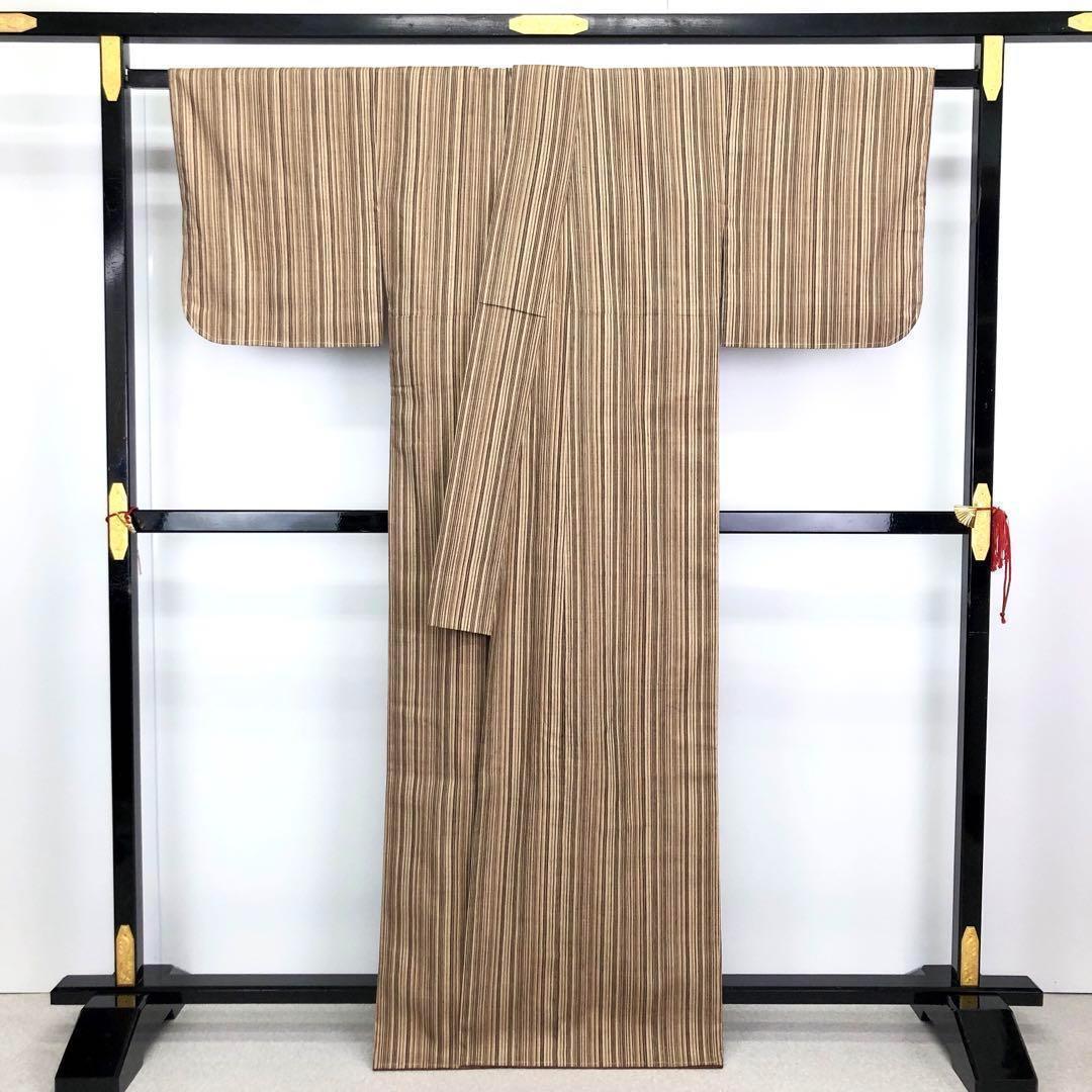 本場結城紬 結 重要無形文化財 縦縞模様 証紙付 胡桃色 しつけ糸 K-2883 本場結城紬 結 重要無形文化財 縦縞模様 証紙付 胡桃色 しつけ糸 K-2883