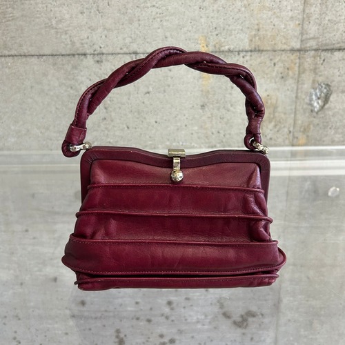Leather mini bag with clasp