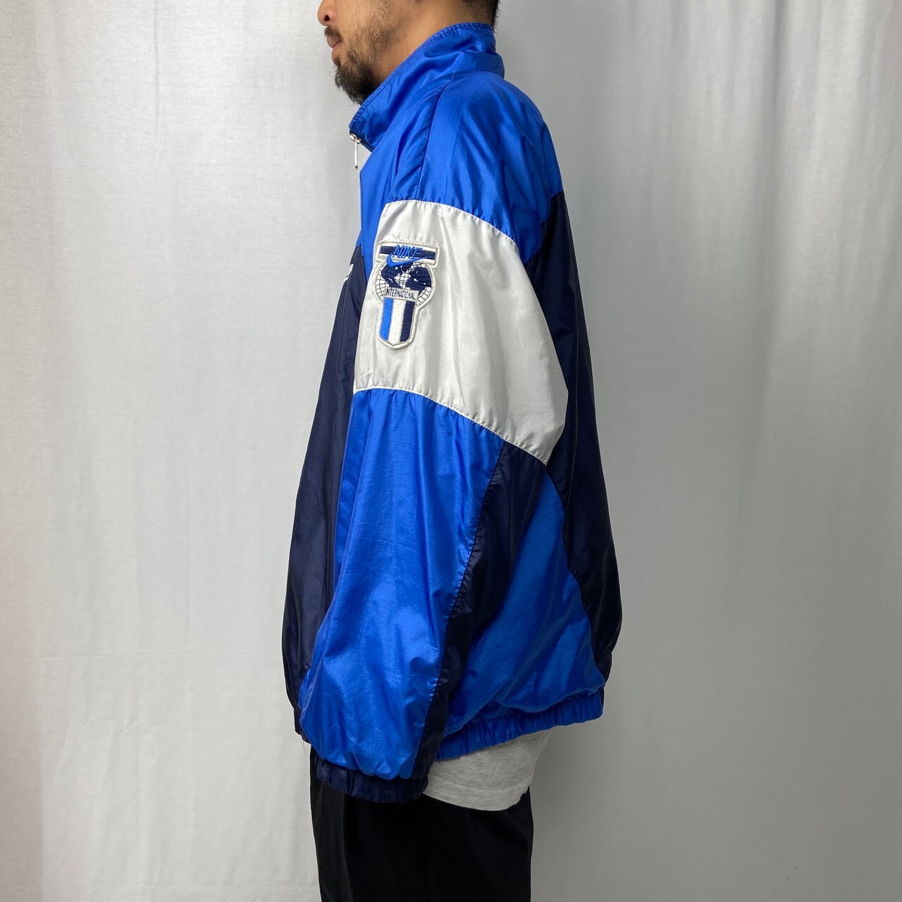 90s Vintage NIKE 銀タグ　トラックジャケット　セットアップ　紺色 90年代 NIKE INTETRNATIONAL ナイキ 銀タグ ワンポイントロゴ刺繍 切替