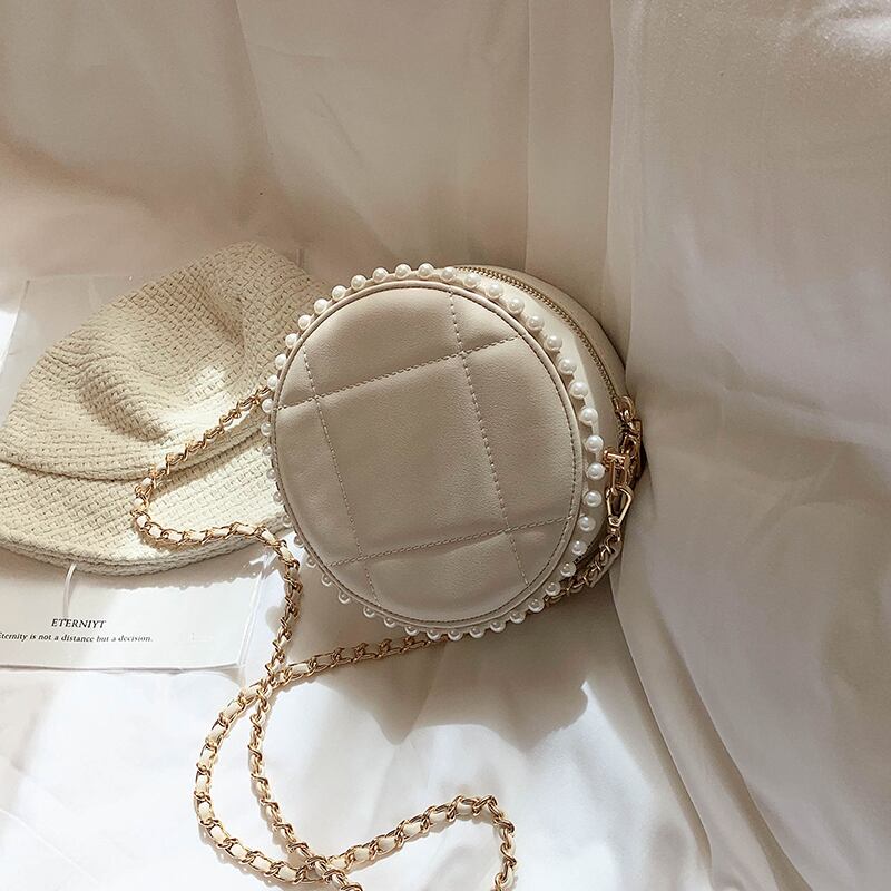 パールレディーススモールバッグ2020夏ニューウェーブファッションワイルドチェーンメッセンジャーバッグインネットレッドスモールラウンドバッグ Tiancai_Wing_Bag6232133