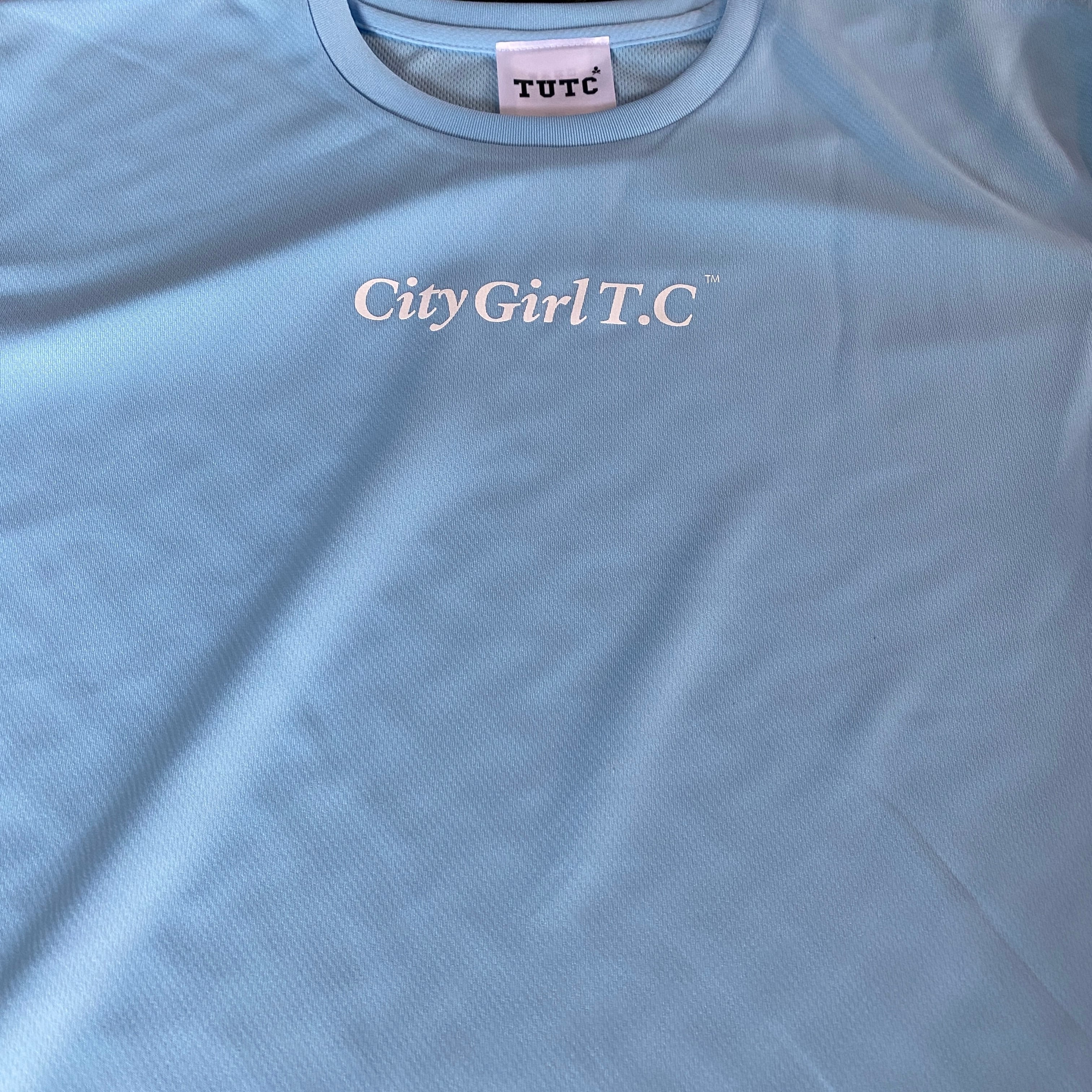 CGGS-001NCBxWH CityGirTC ドライゲームシャツ ノースカロライナブルー