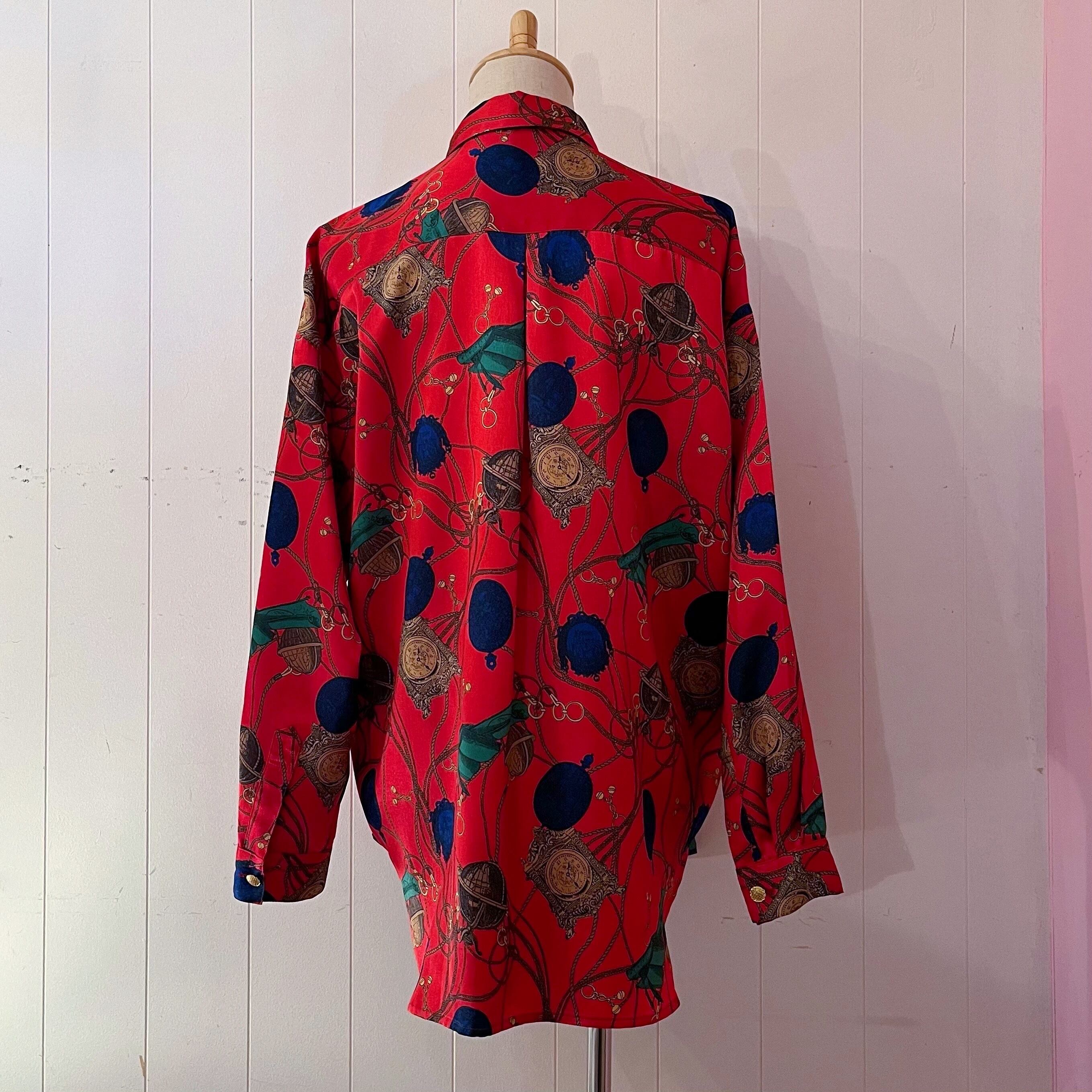 clock and globe red satin blouse