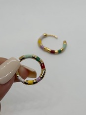 colorful hoop pierce