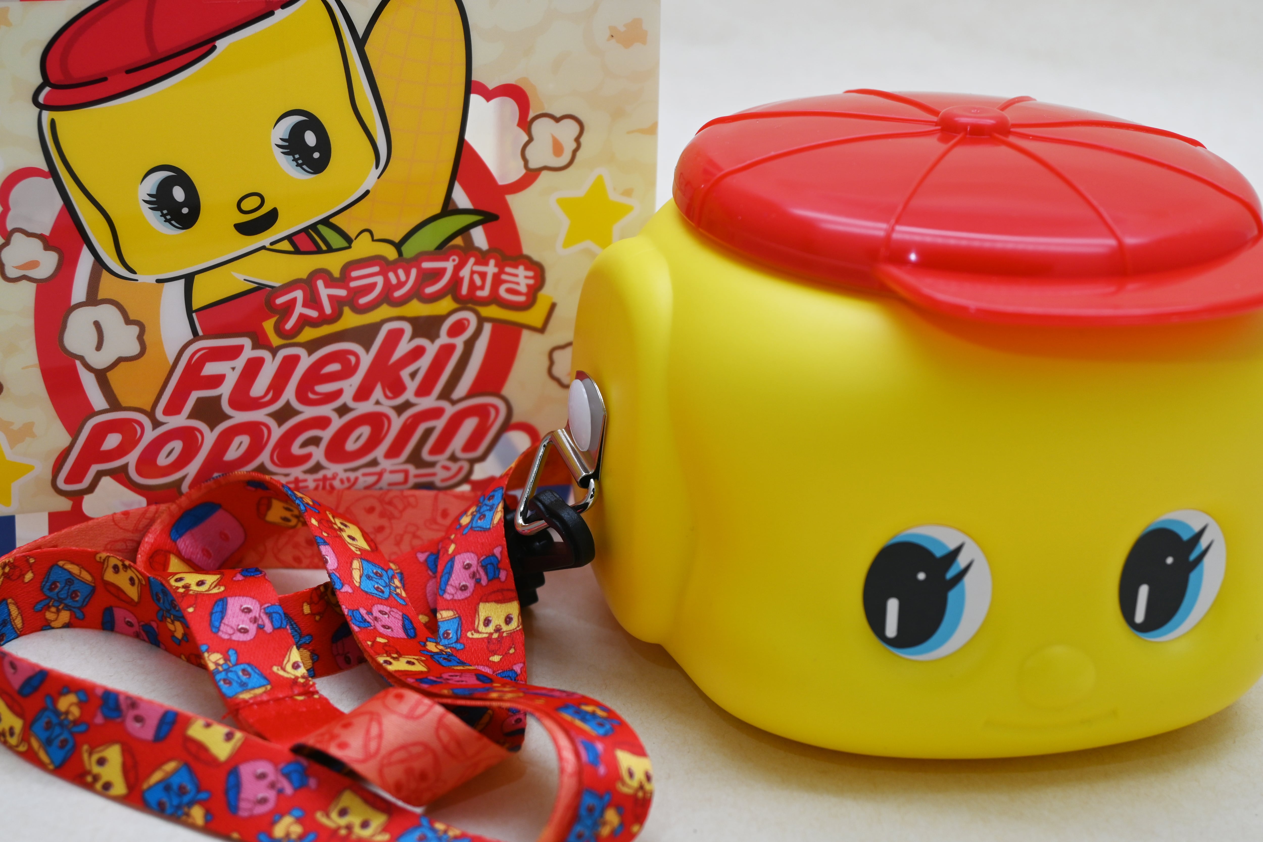ストラップ付きフエキポップコーンバケツ(キャラメル／赤)