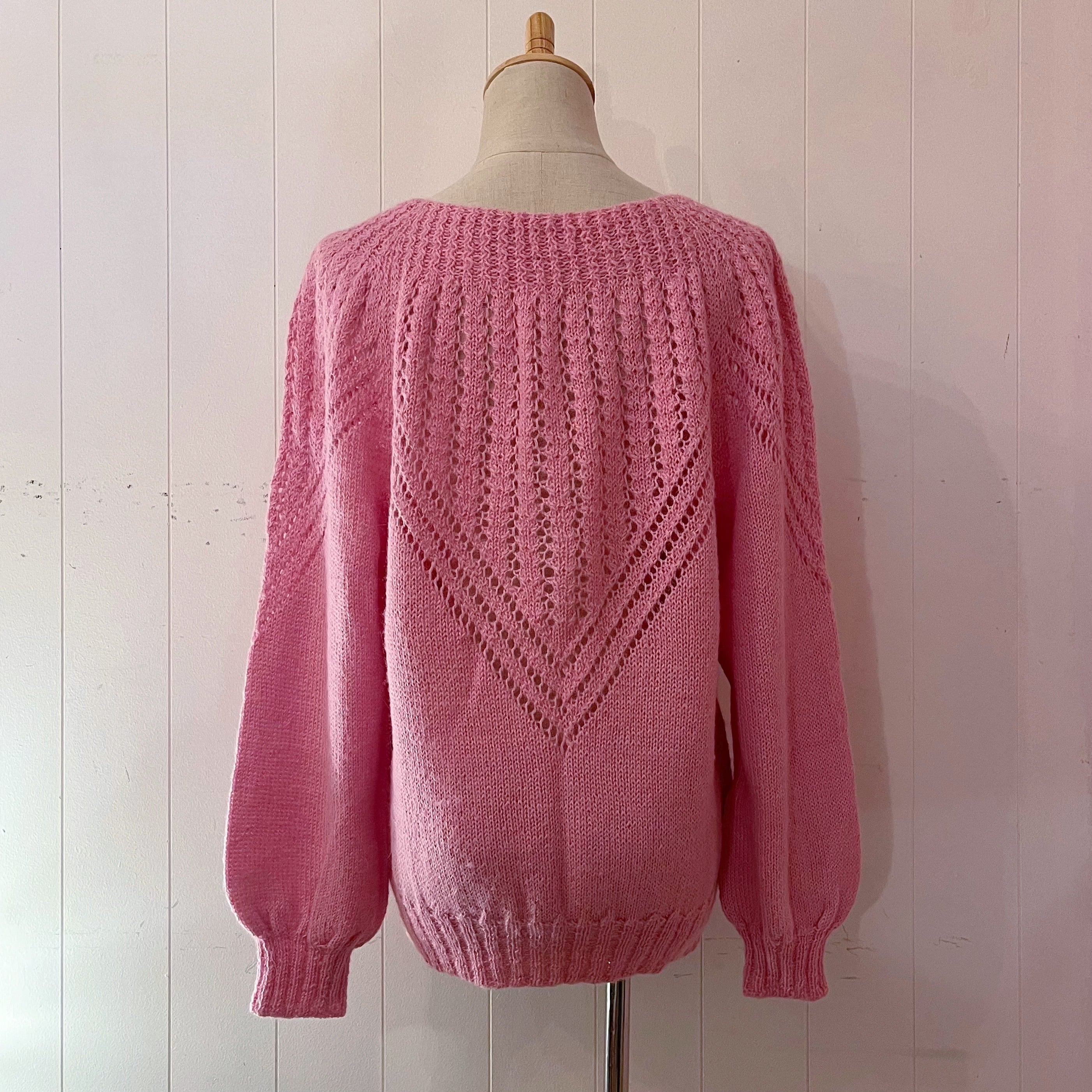 pink openwork knit sweater