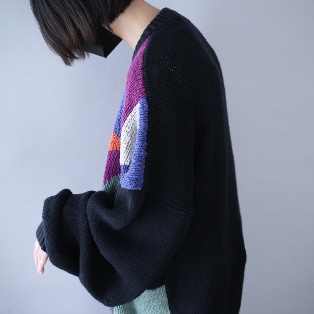 black base colorful art pattern over silhouette knit