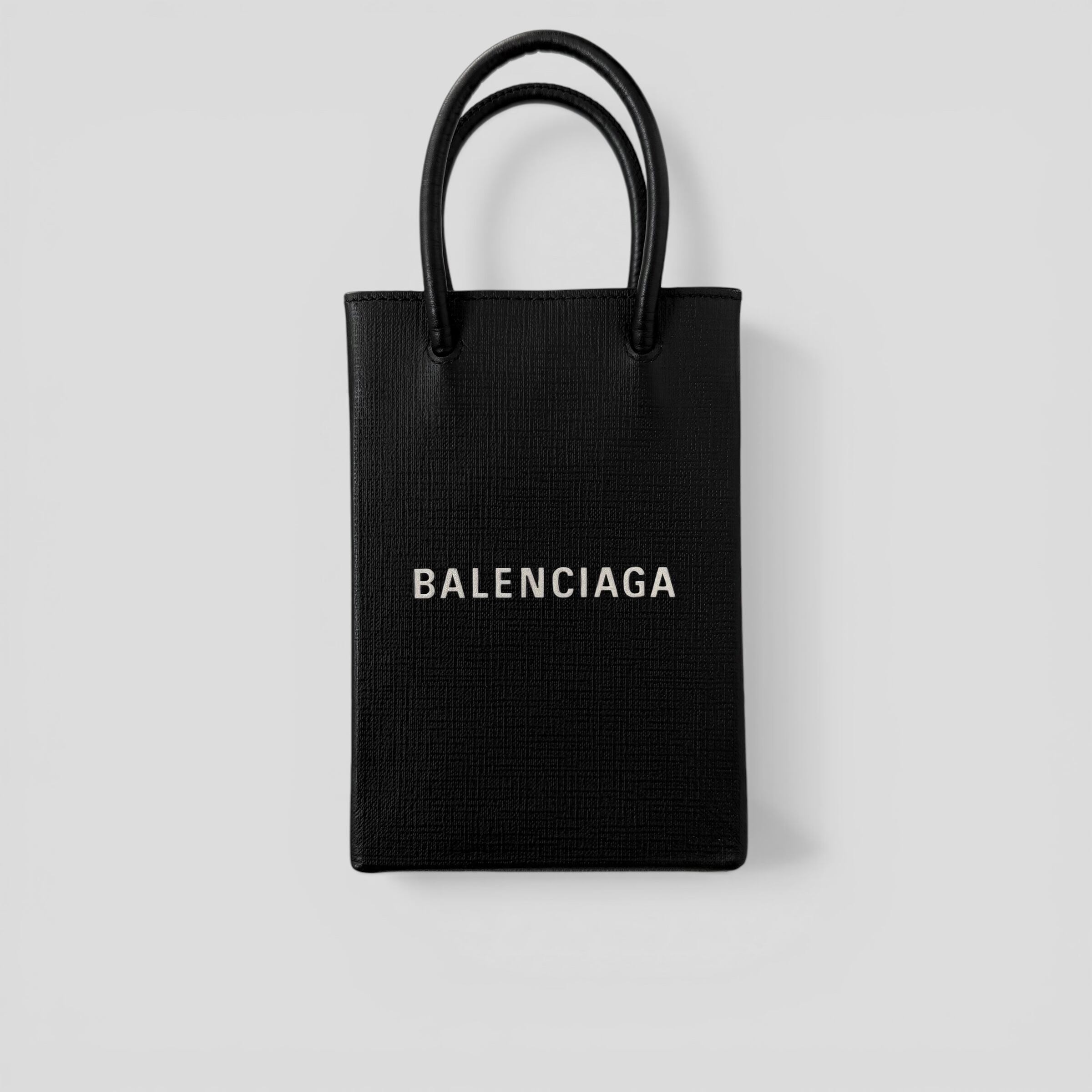 BALENCIAGA Shopping Phone Holder Black | BRAND RESORT Online