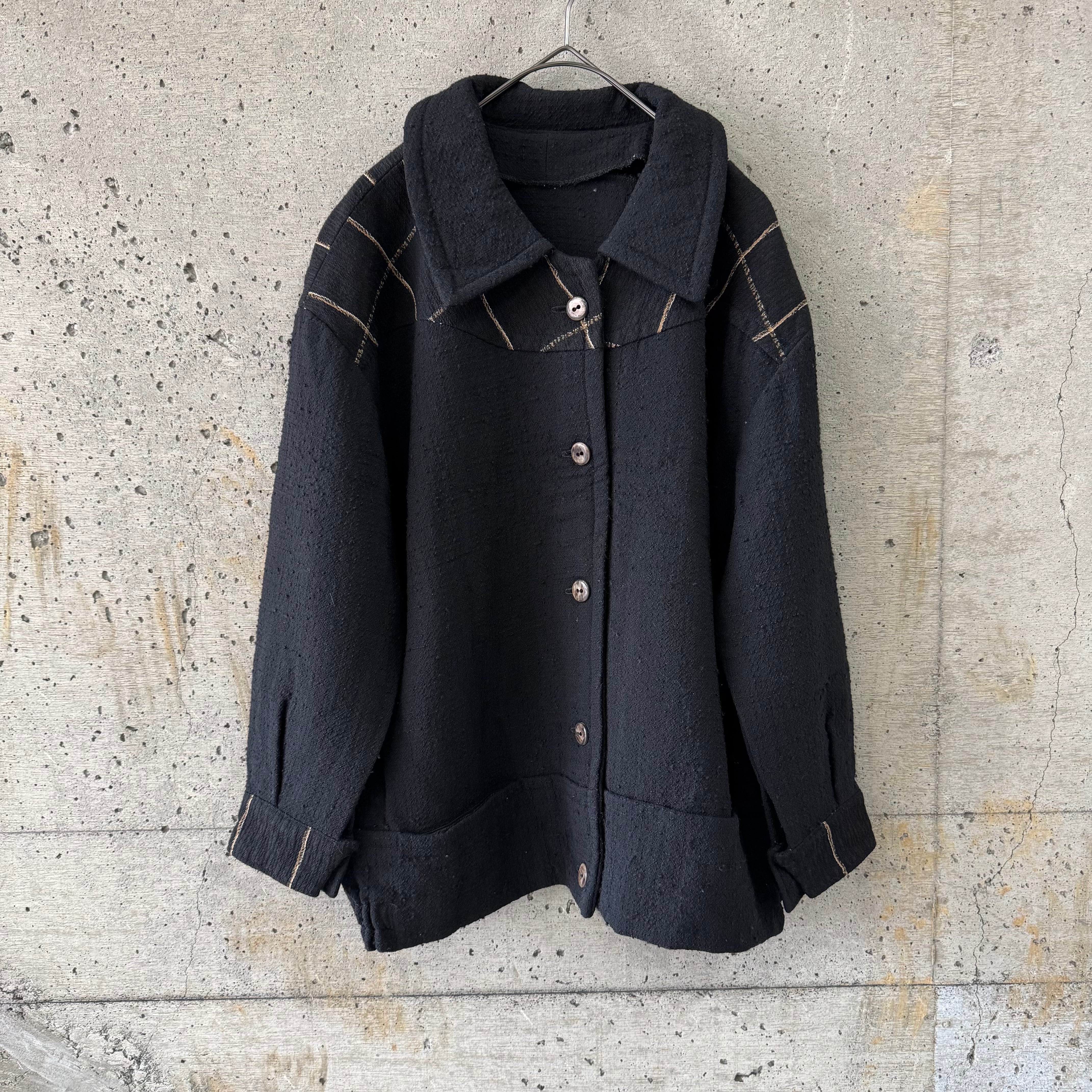Black coarse woven blouson shirt