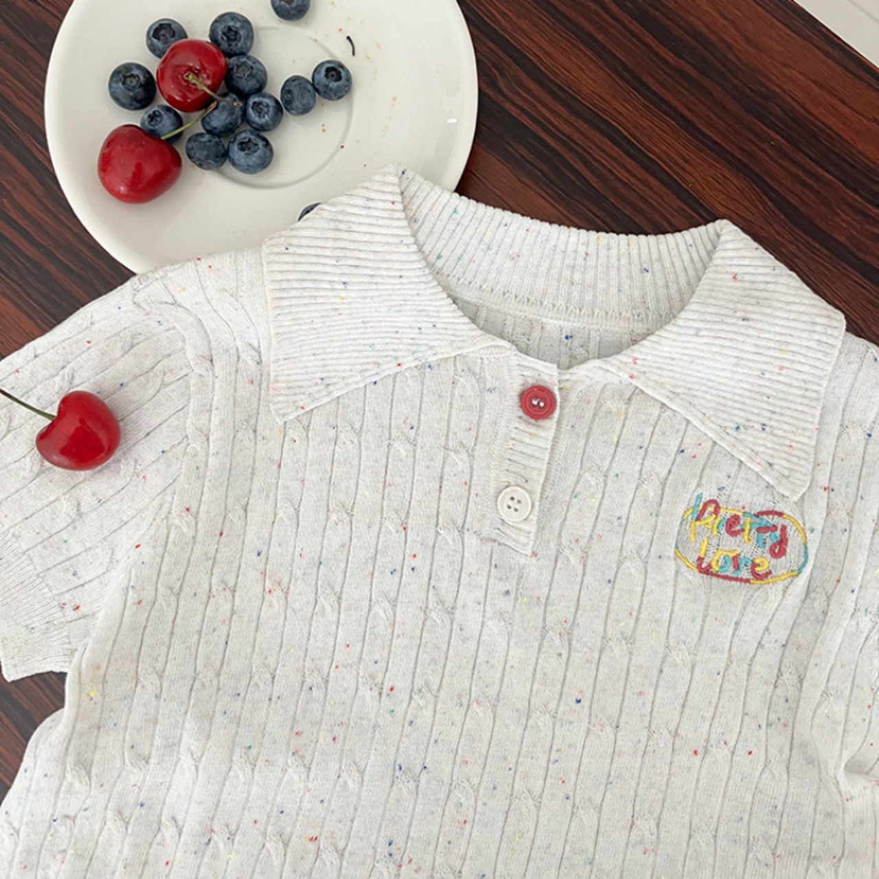 夏英字刺しゅうケーブルニットポロシャツ