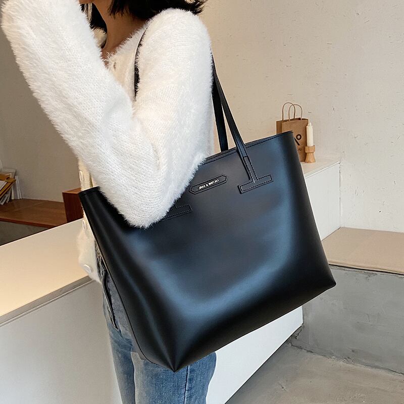 ウエスタンスタイルワンショルダービッグバッグ女性2020ワイルド大容量テクスチャーバッグシンプルファッショントートバッグの新しい流行バージョン Tiancai_Wing_Bag45130824968