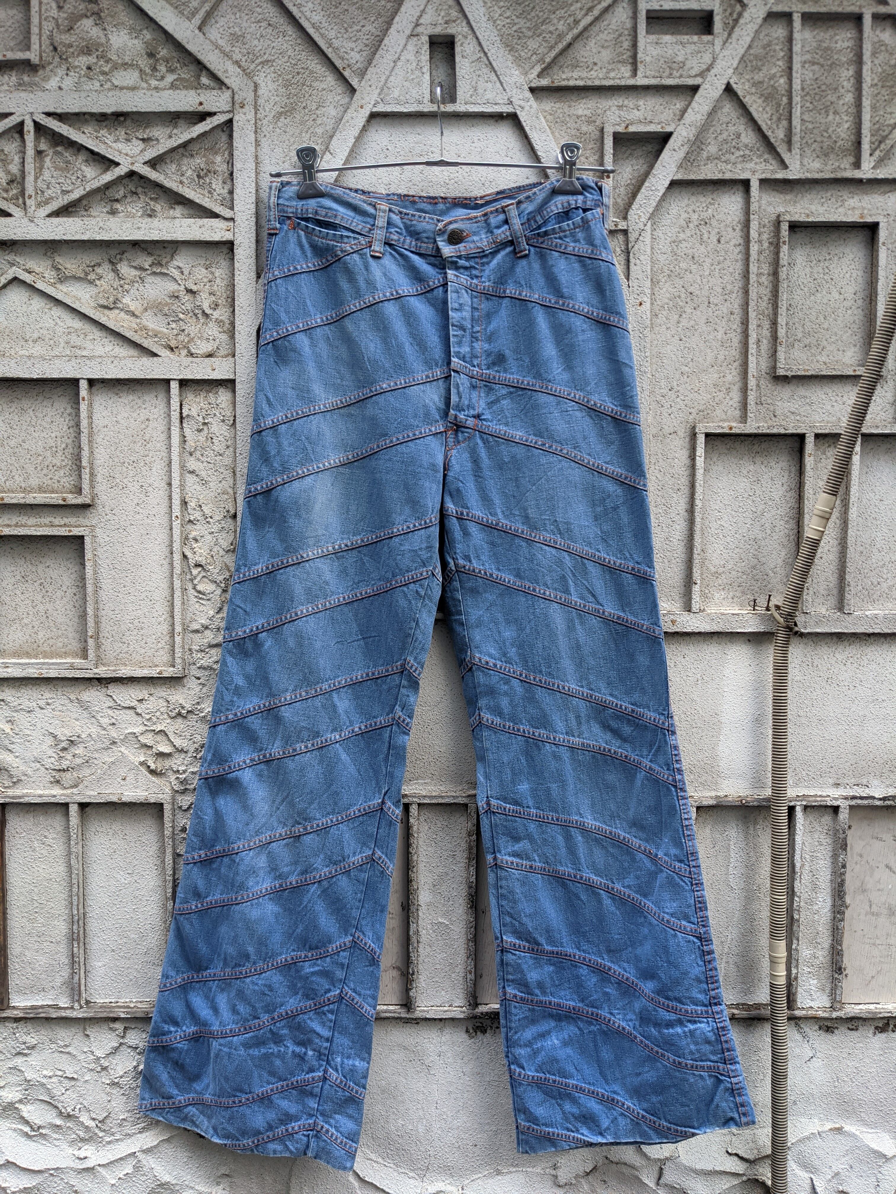 "DESIGN FLAIR DENIM PANTS"