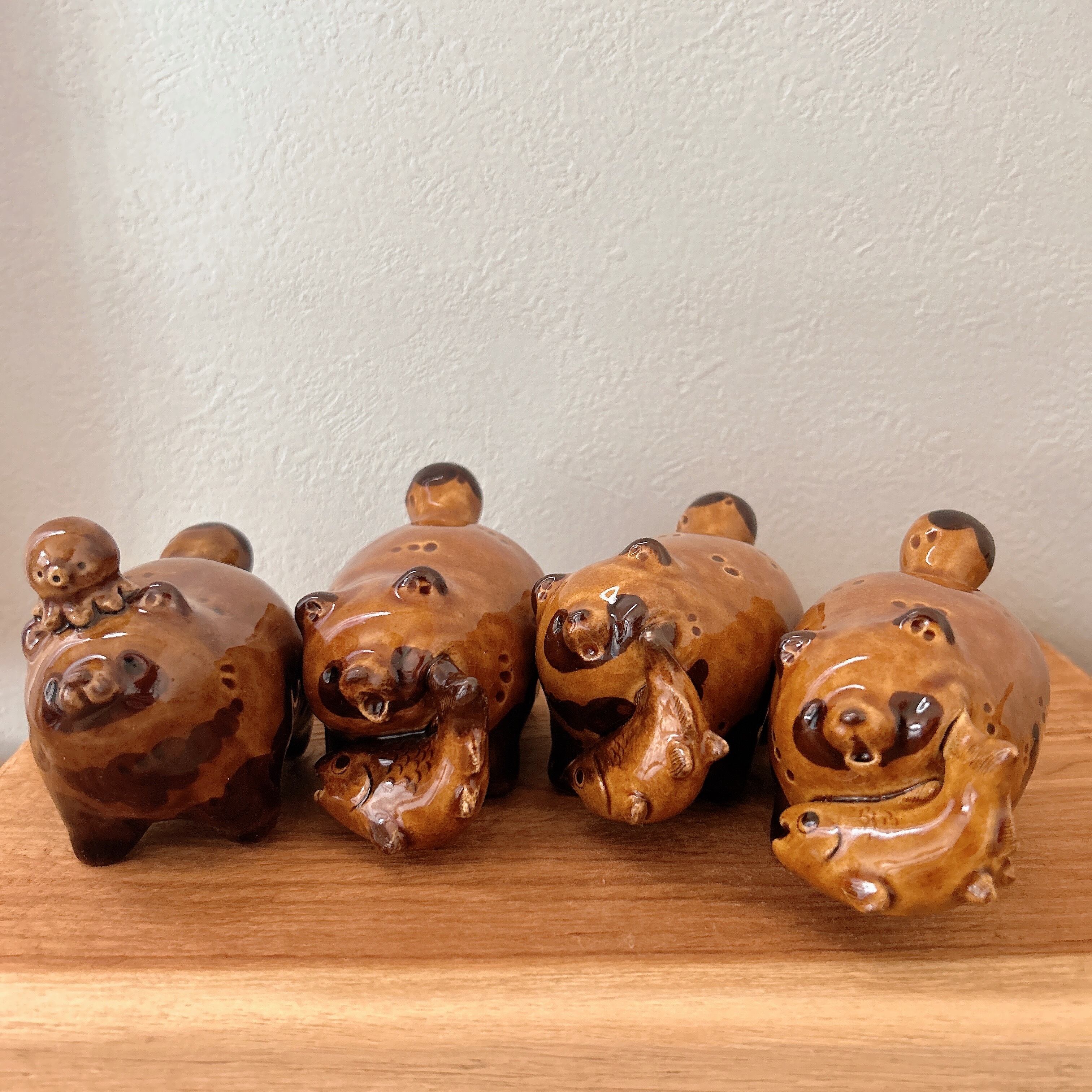 木彫りの熊風たぬき タコさんwinner | BlueBell