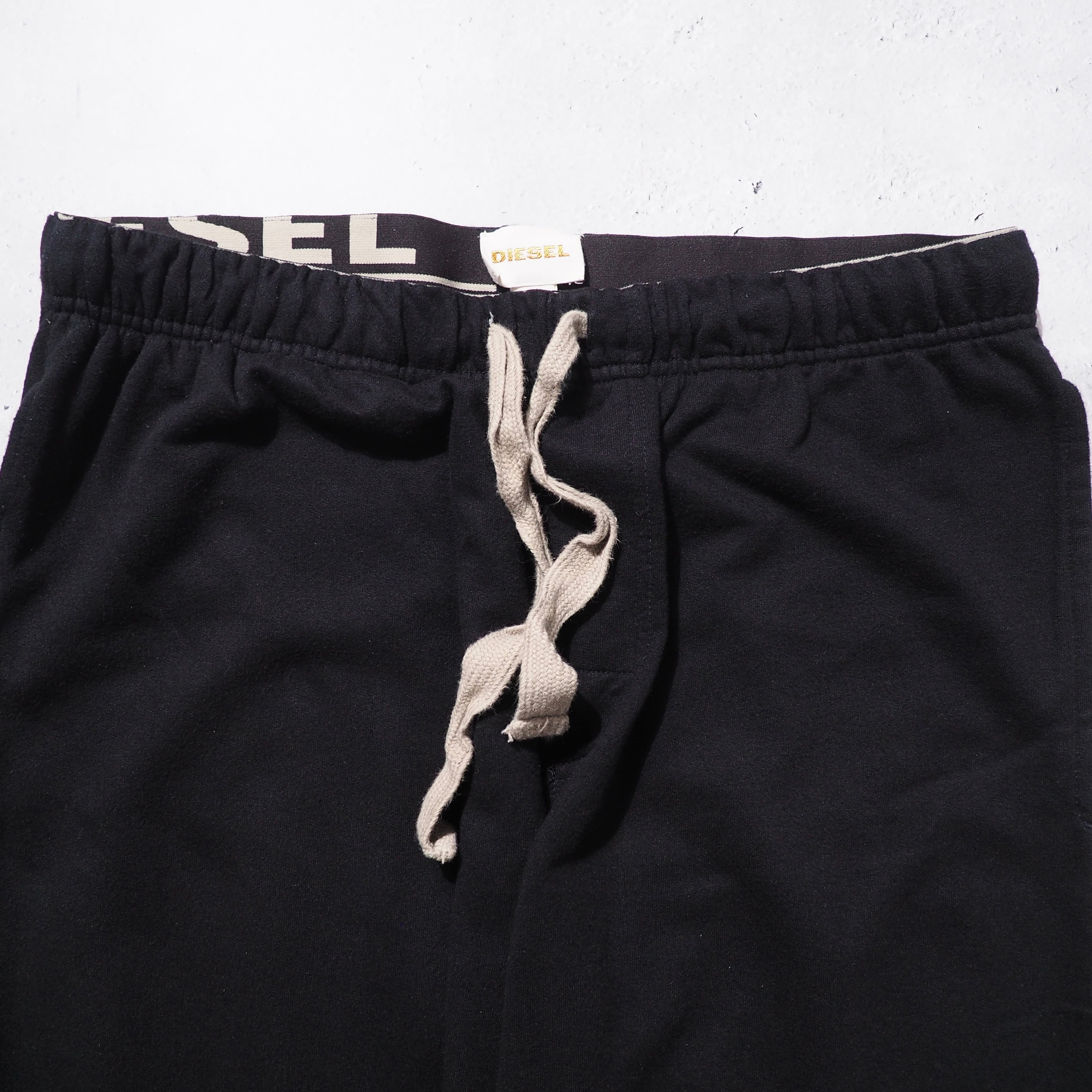” DIESEL ” Graphic logo printed wide Sweat pants