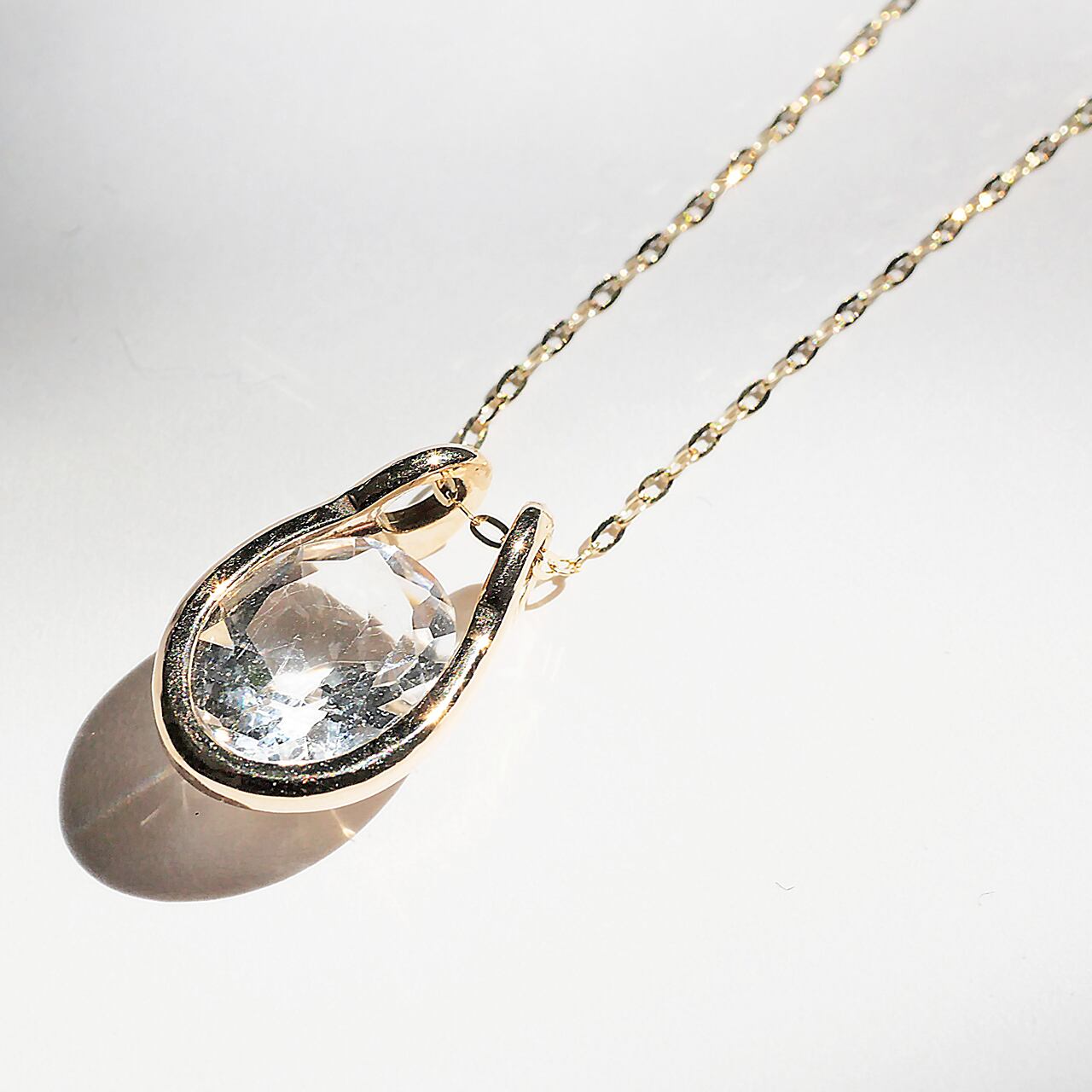 K10 スクープペンダント 水晶 | Nando Jewelry