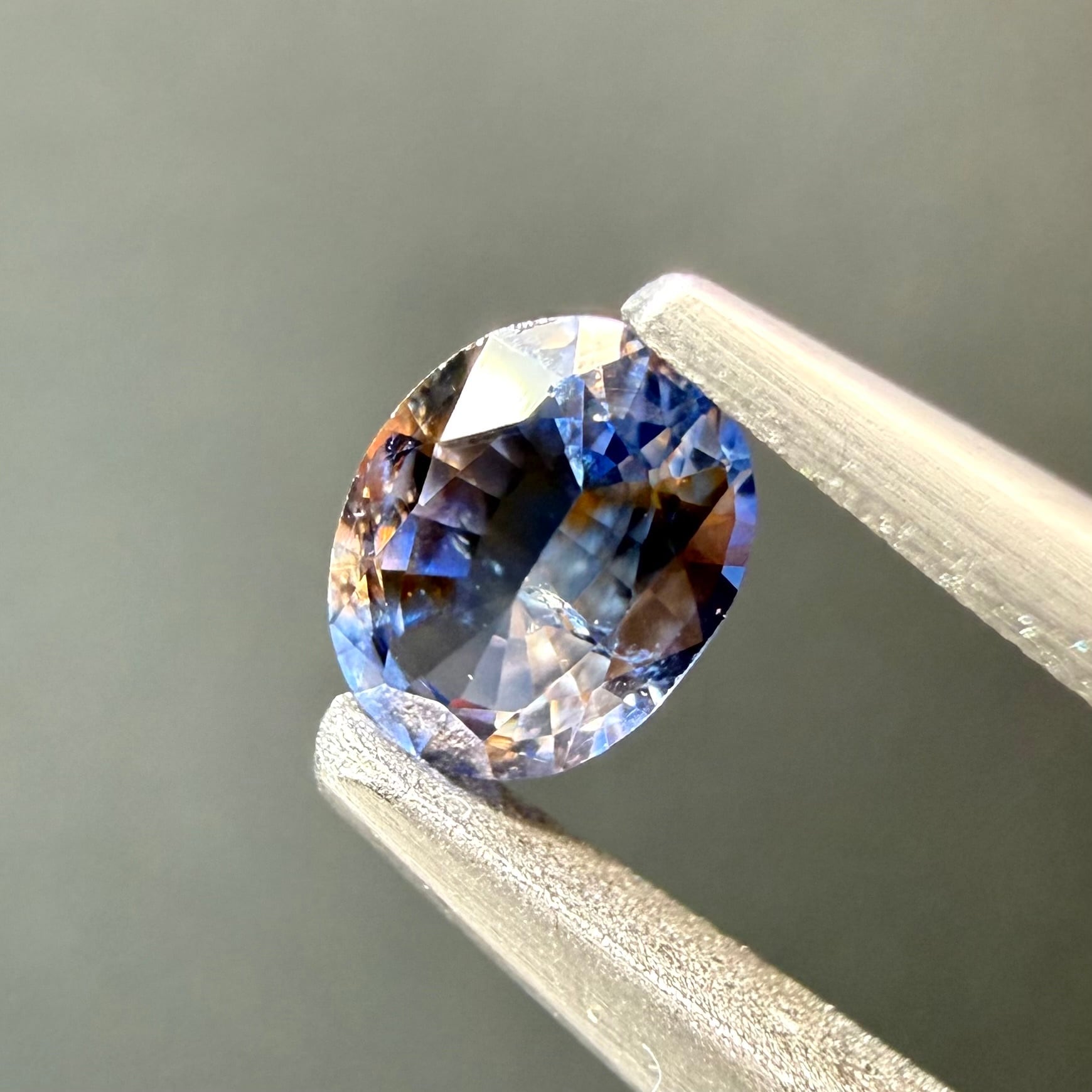 スリランカ産バイカラーサファイアオレンジ×ブルー0.29ct 4.46×3.5