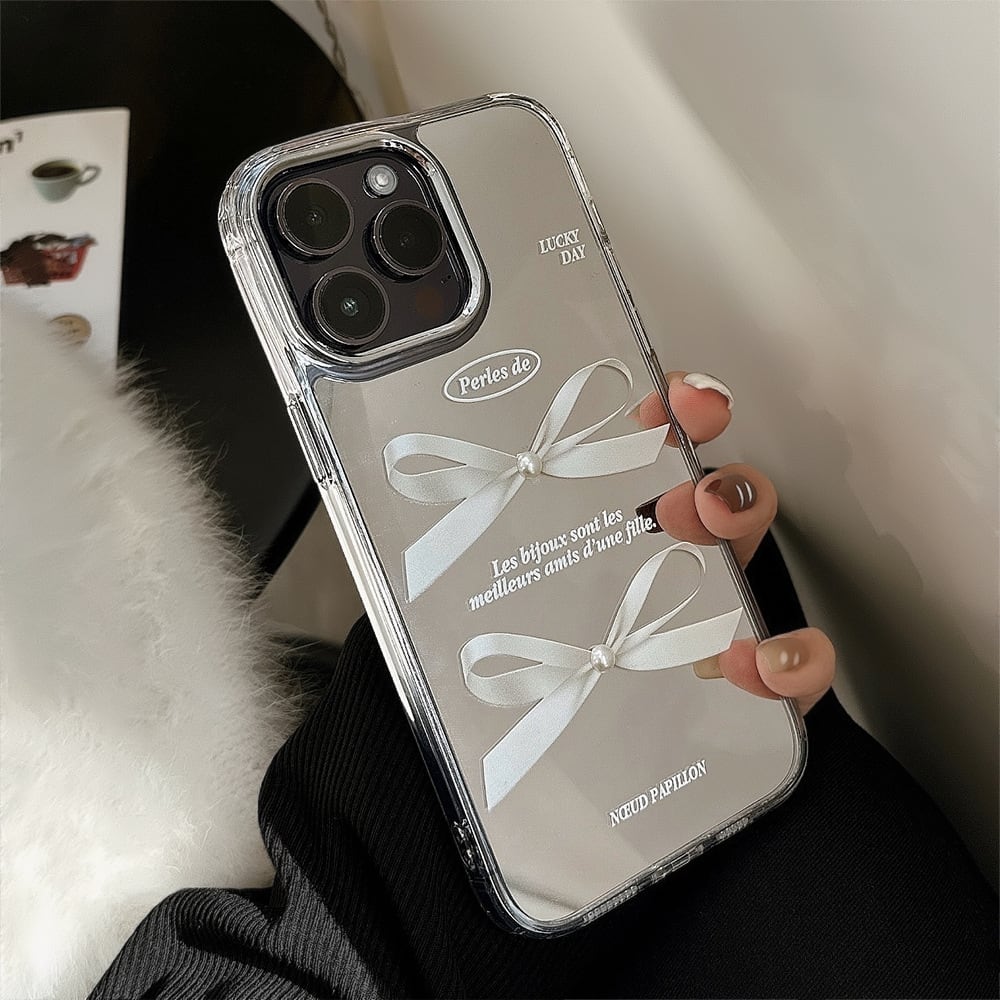人気のリボン×ミラー背面◎大人可愛い パール iPhone16 カメラ保護