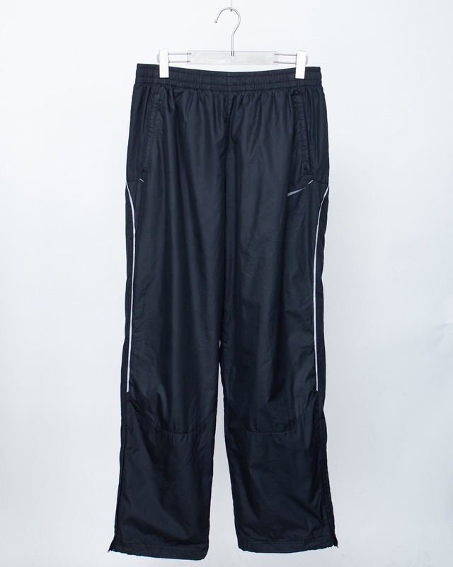 "NIKE" wide silhouette nylon easy trousers