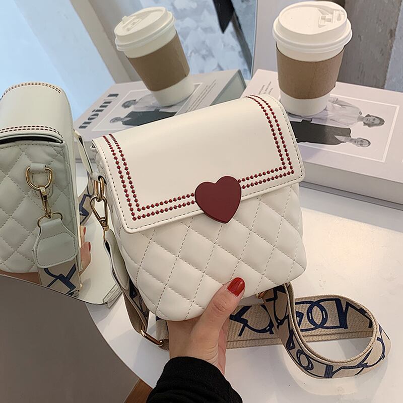 センスの良い小さなバッグレディースバッグ2020新しい流行のファッション広いショルダーストラップメッセンジャーバッグネット有名人海洋菱形バケットバッグ Tiancai_Wing_Bag81262320269