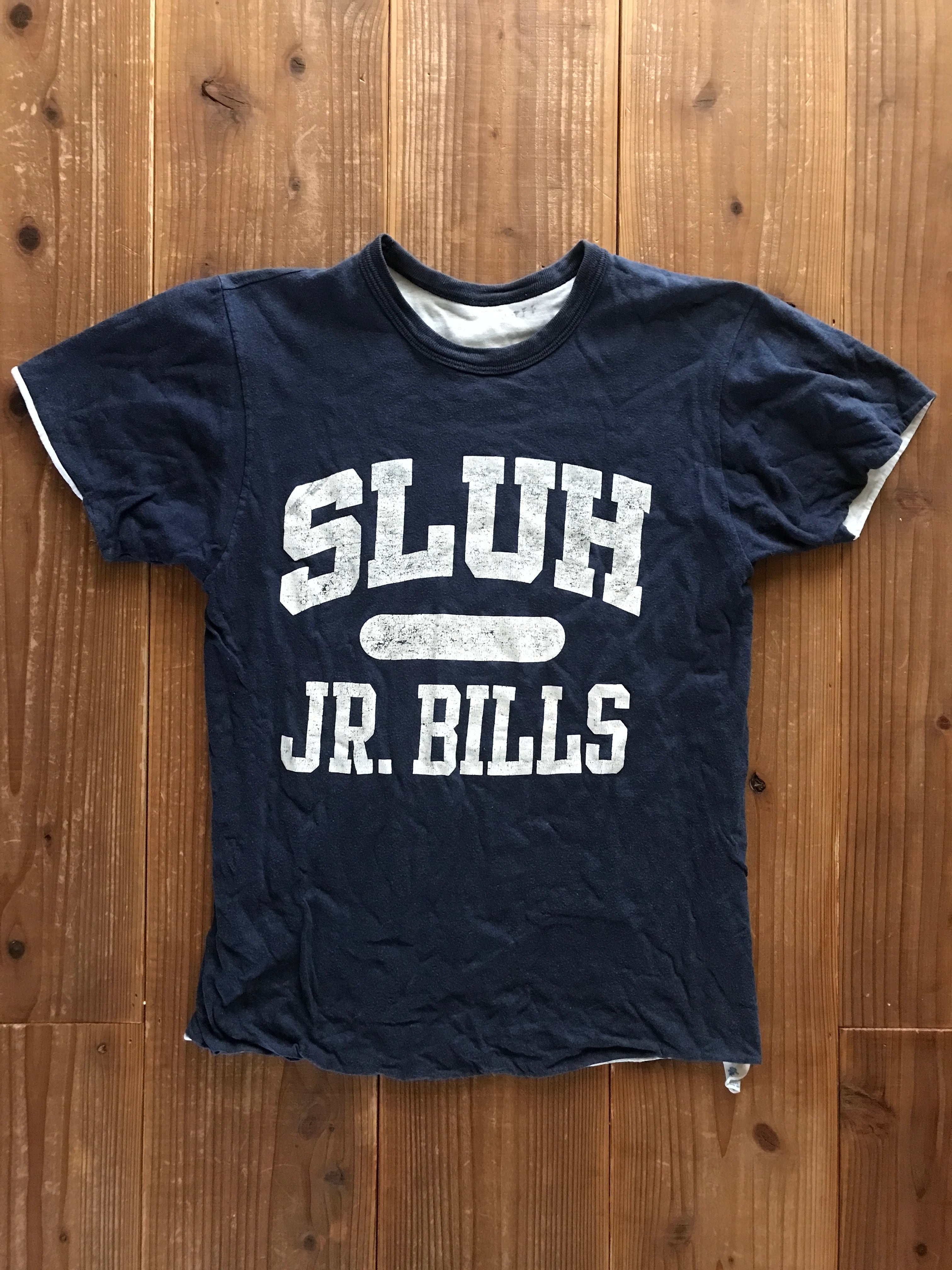80's Champion トリコタグ "SLUH JR. BILLS" リバーシブルTシャツ 3段プリント 表記(M)