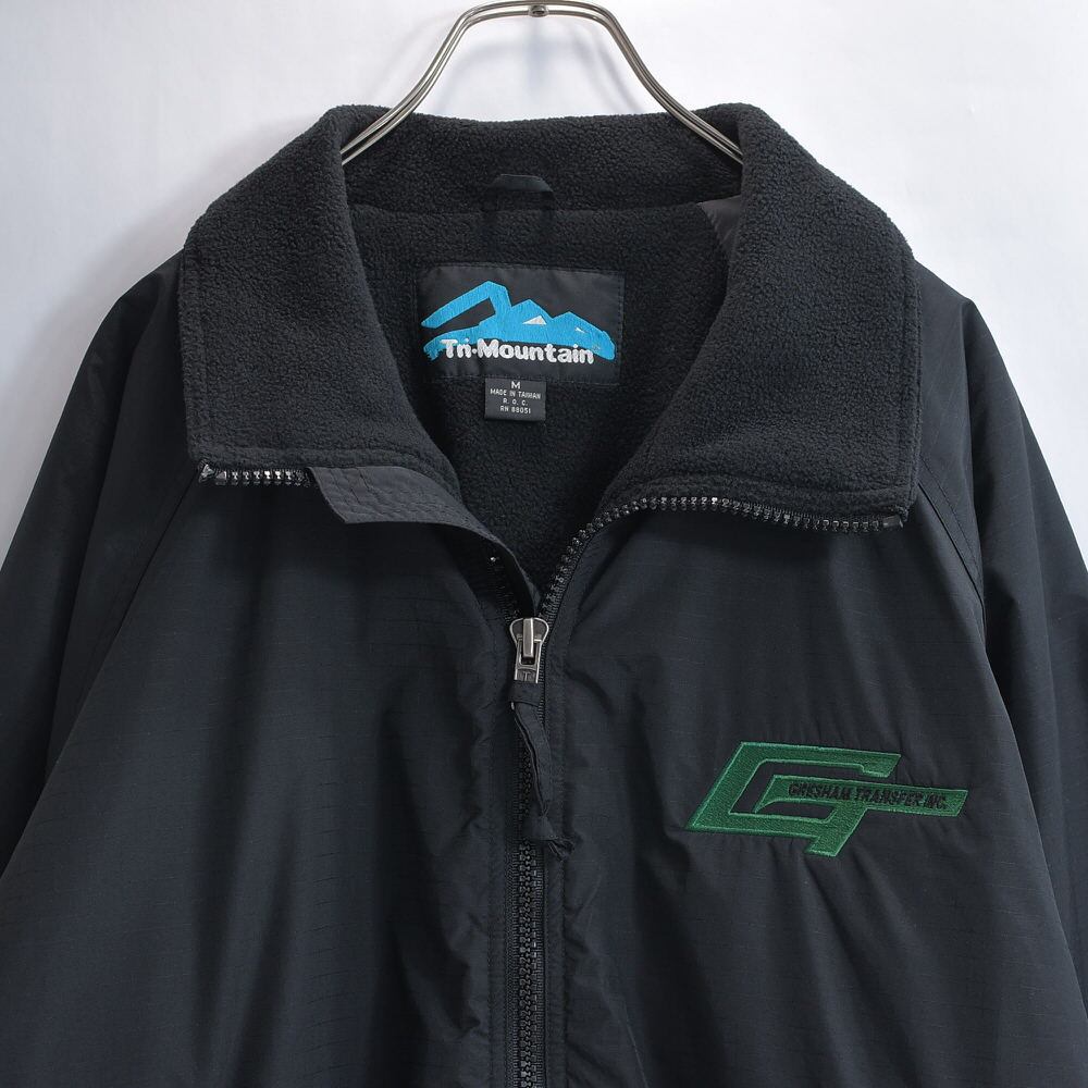 90s~ Tri-Mountain ナイロンリップストップ 企業ロゴ刺繍 シェルドシルチラ アウター ヴィンテージ ジャンパー ブラック ビンテージ USA アメリカ古着 メンズL~相当