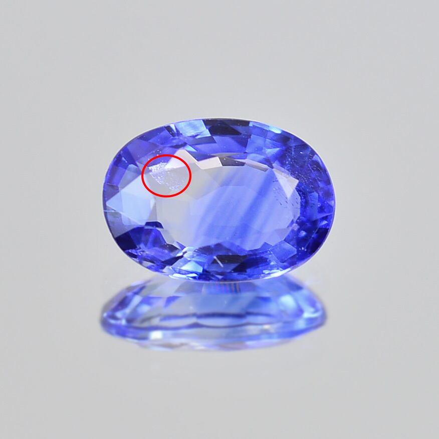 ソ付 ブルー サファイア 0.592ct ルース オーバル バイカラー系