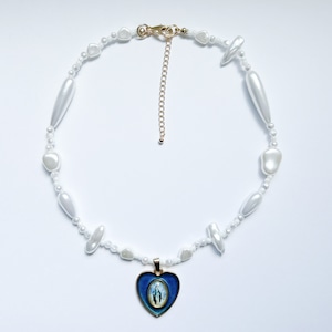 Maria in blue heart and Pearl necklace