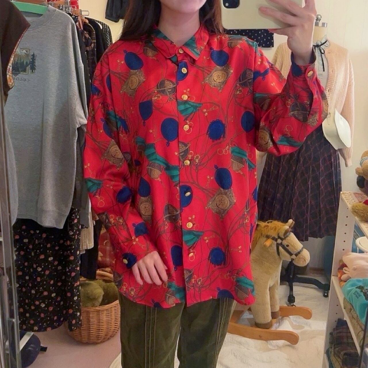 clock and globe red satin blouse