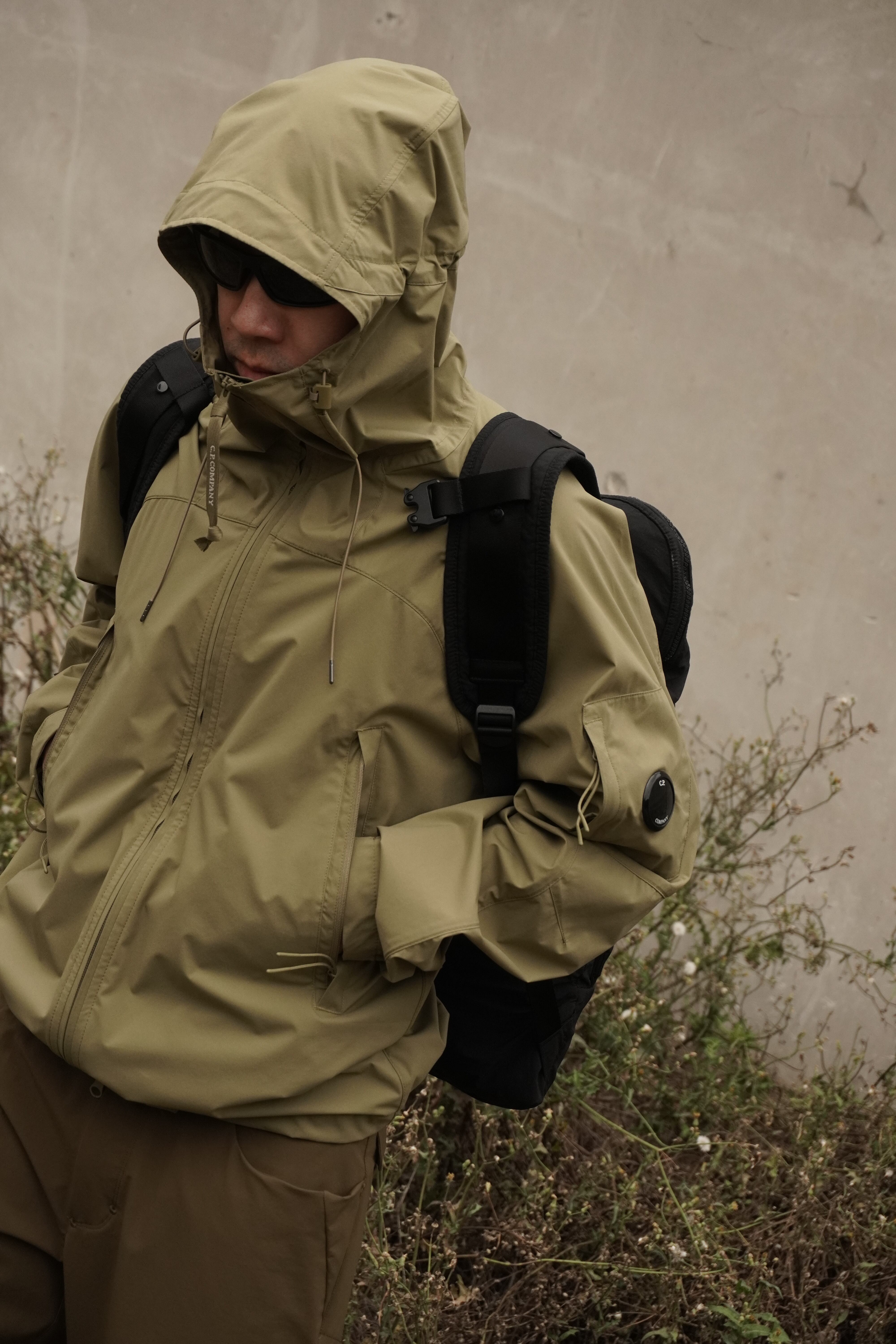 C.P. COMPANY PRO-TEK HOODED LENS JACKET (OLIVE) | SO SHOP & HOSTEL