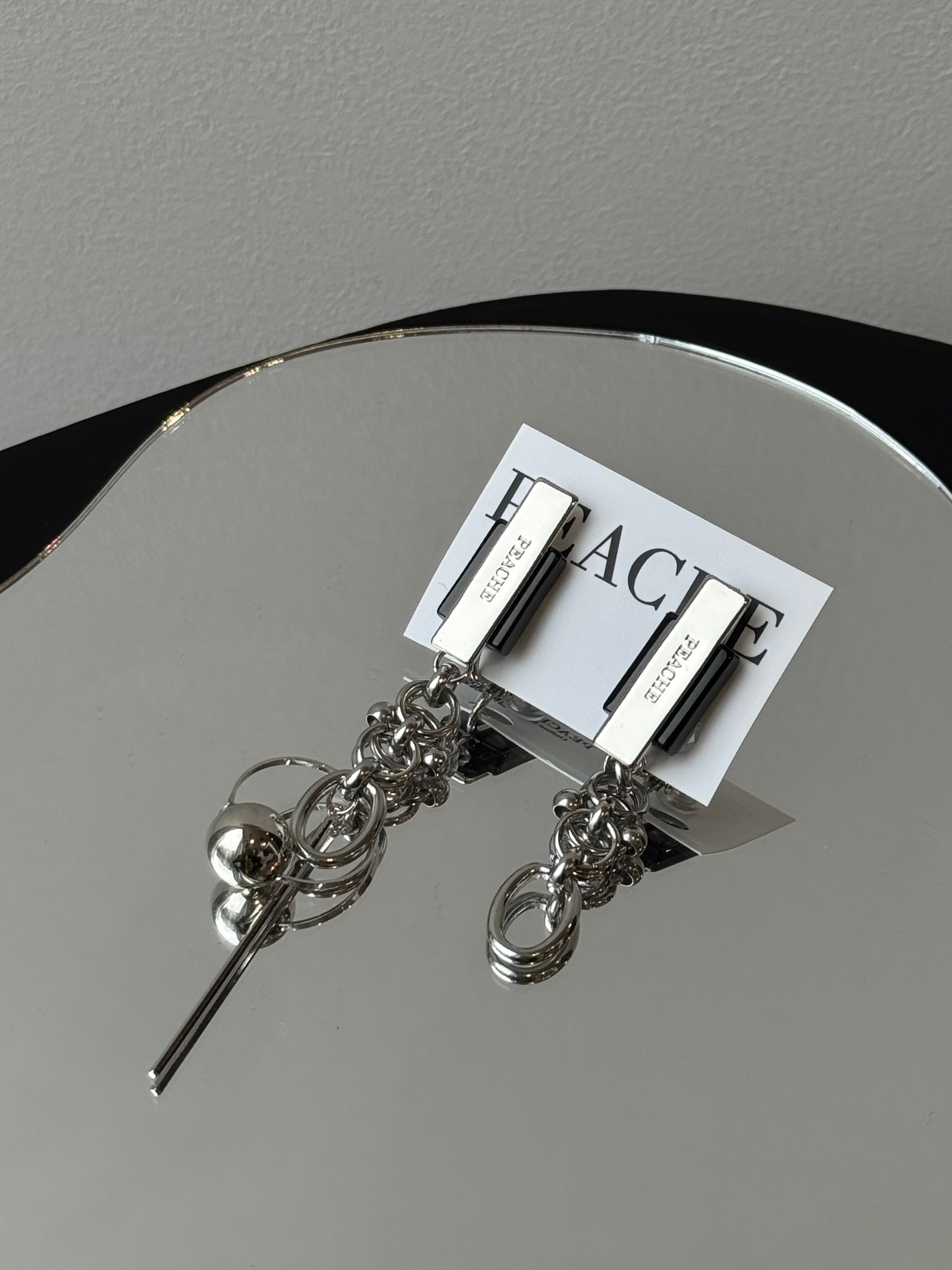 onyx silver stick circle random asymmetry