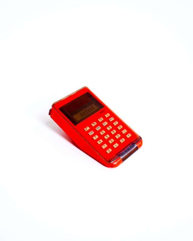 Orange measuring tape & calculator